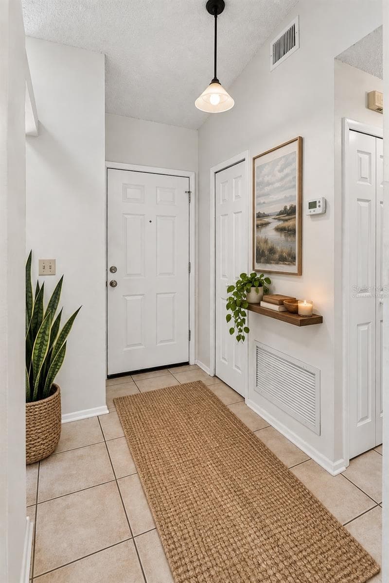 Virtually Staged - Foyer - 9911 LANCEWOOD ST, ORLANDO