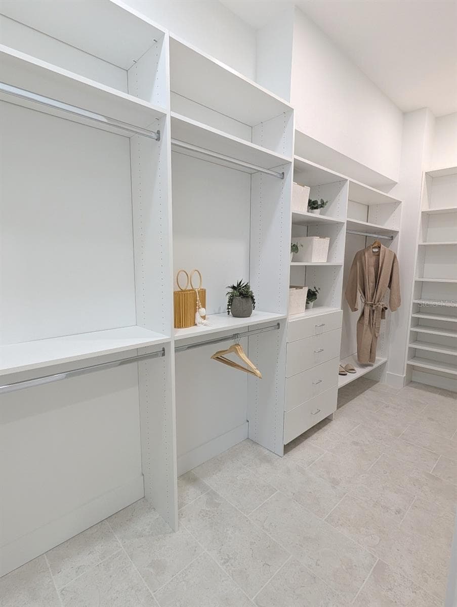 Two spacious walk in closets with custom shelving - 2110 MICHELE DR, SARASOTA