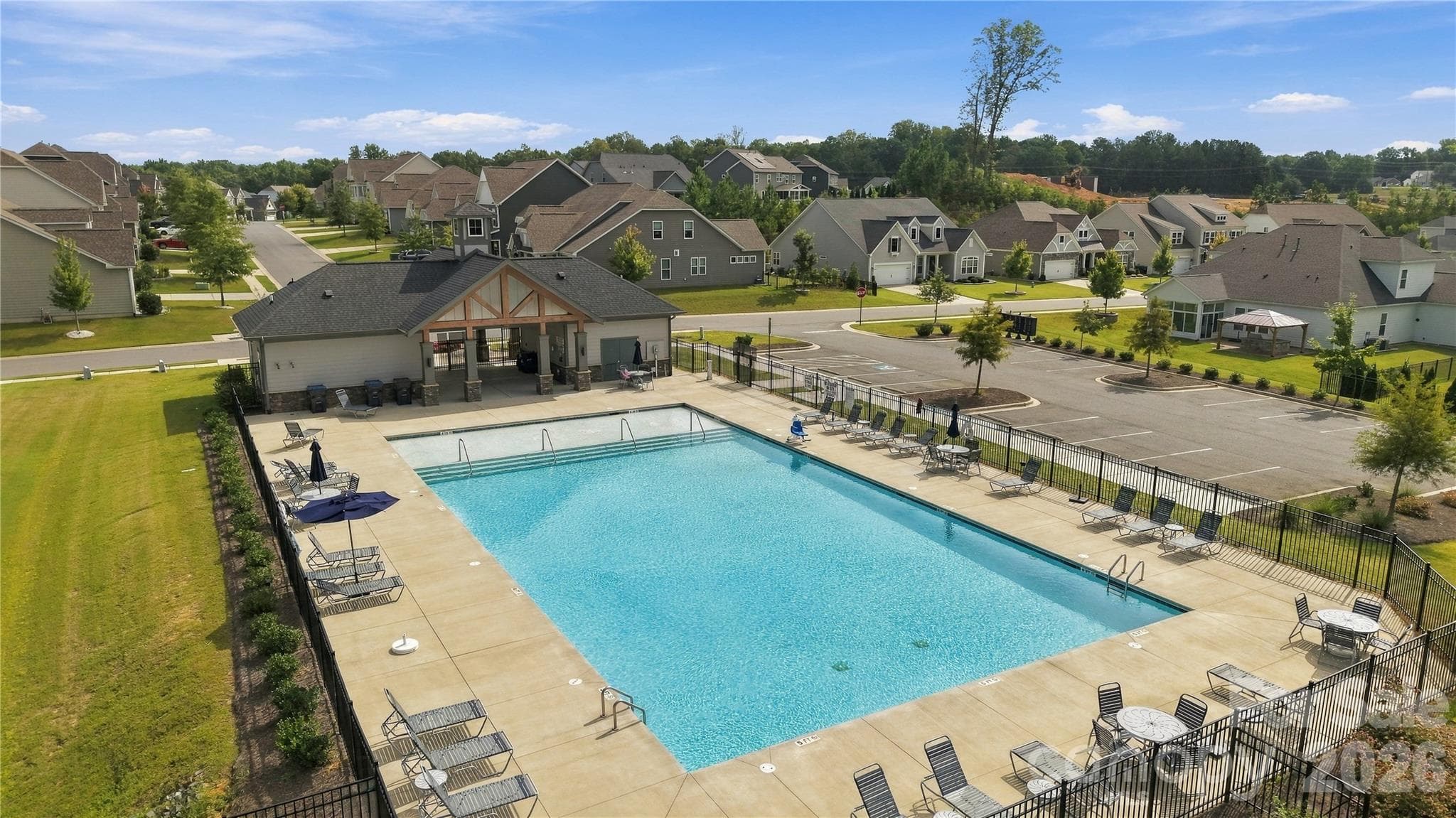 Spend summer days poolside at the community pool—an inviting spot to cool off, relax and meet up with friends. Walk to the pool from 8504 Hope Run Court. - 8504 Hope Run Court, Indian Land