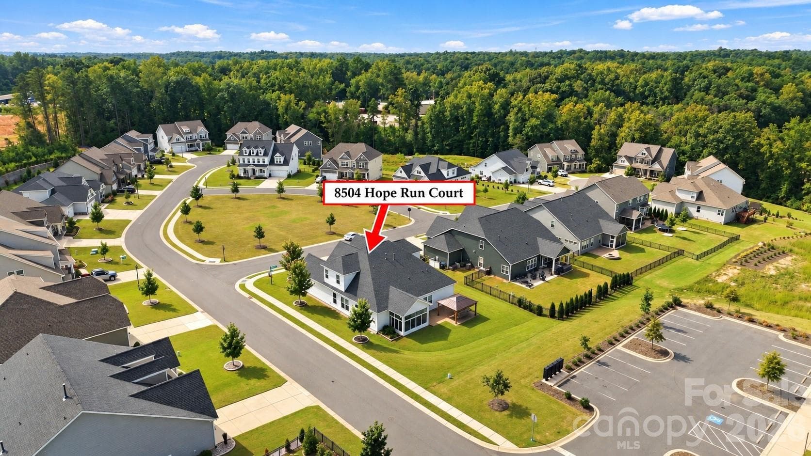 Aerial view of side and back of home, situated at the corner of two cul-de-sac streets with green space in front. - 8504 Hope Run Court, Indian Land