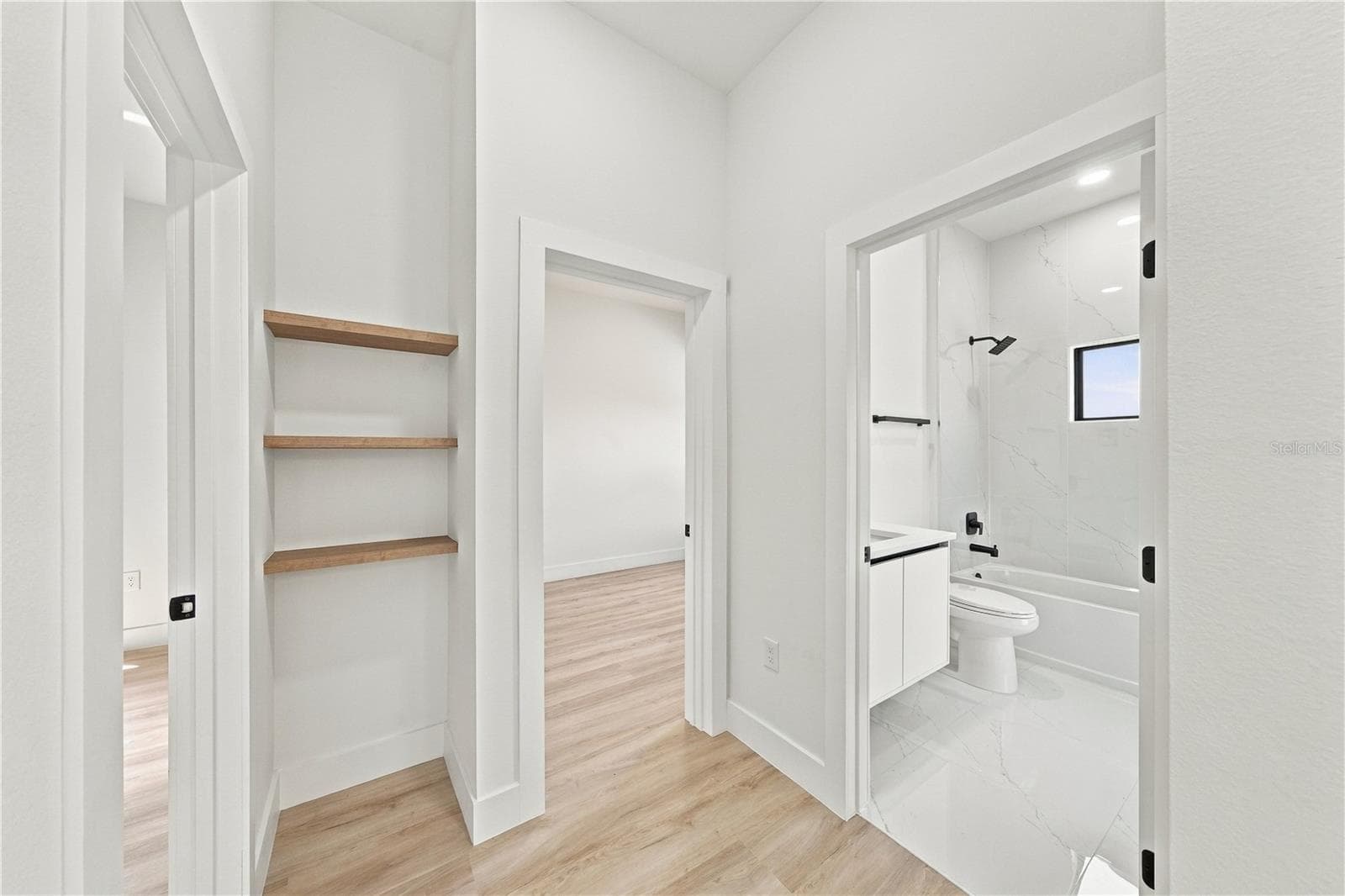Hallway to 2nd & 3rd Bedroom - 3320 TUPELO AVE, NORTH PORT