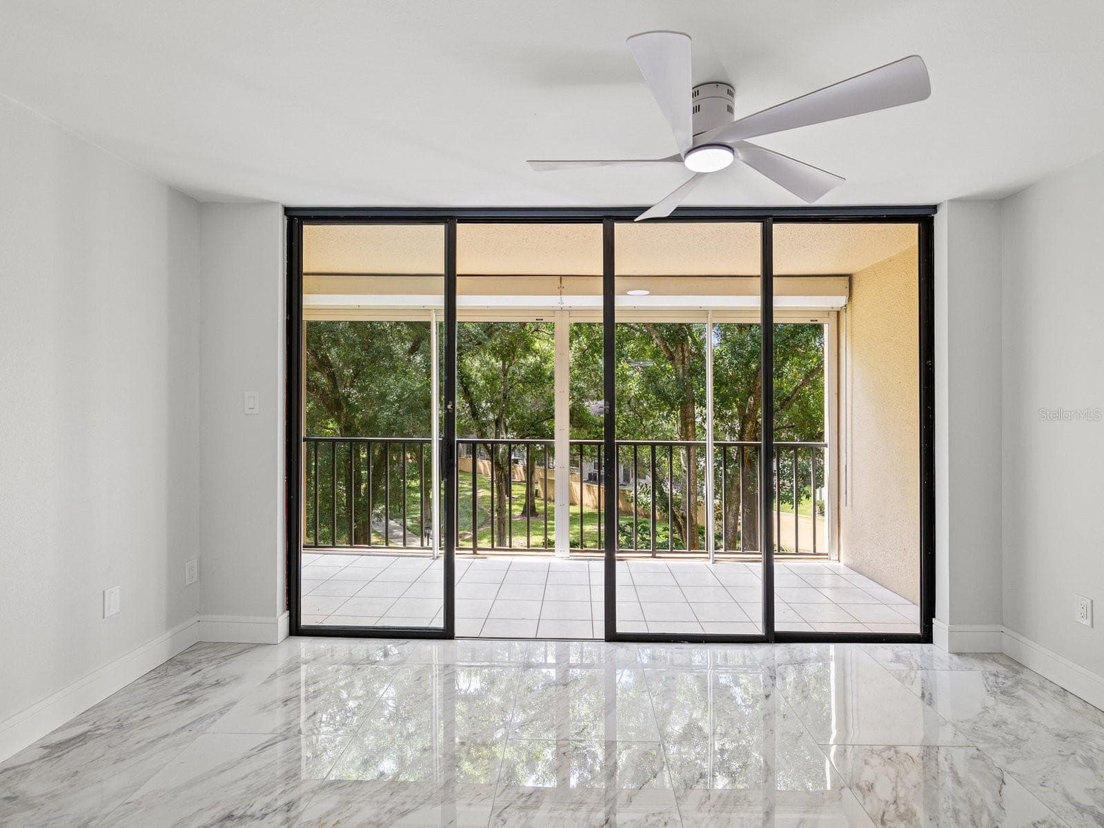 Screen patio with automatic hurricane shutters - 3076 EASTLAND BLVD #203, CLEARWATER