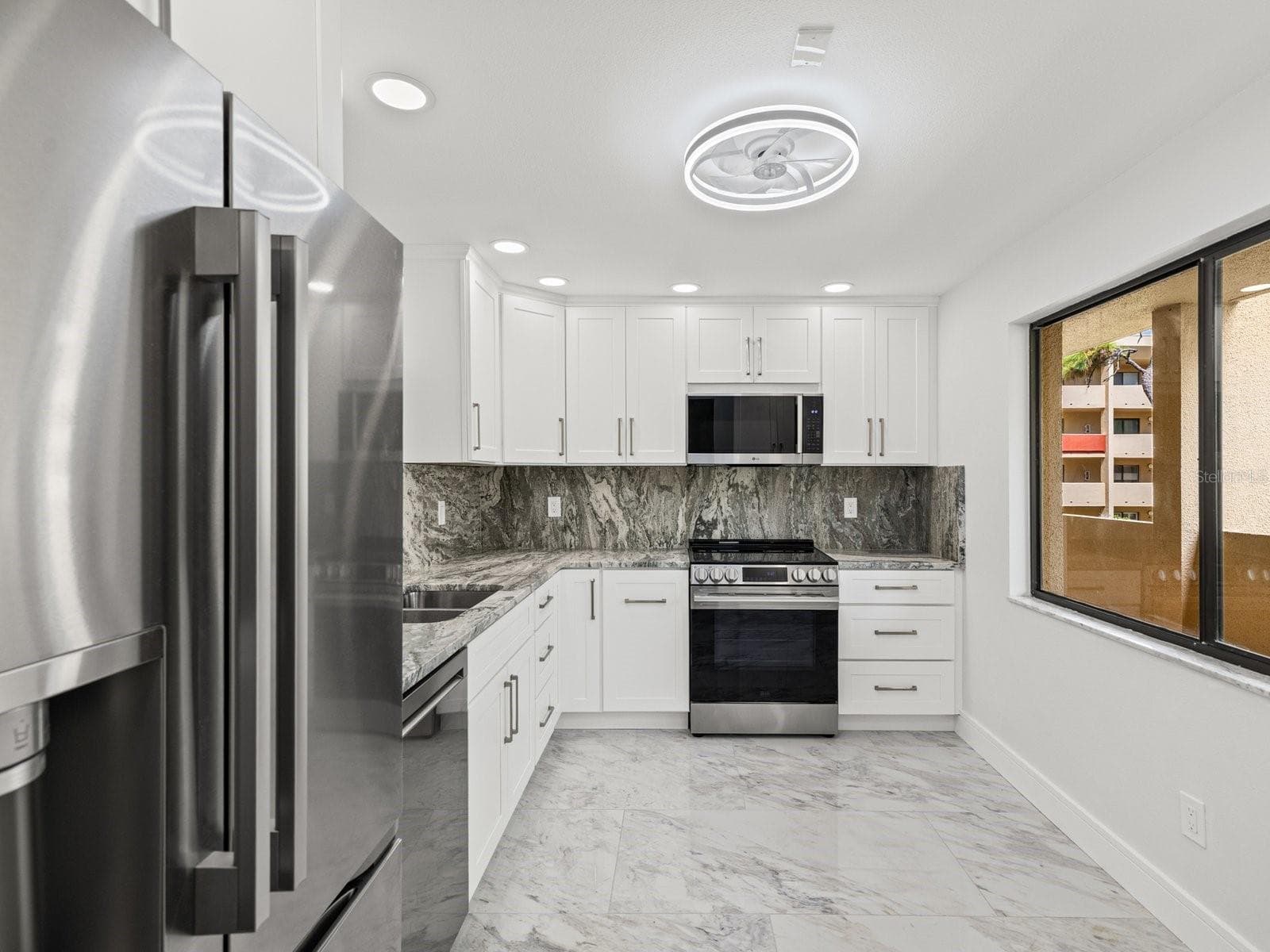 Recessed lighting and ceiling fan all NEW - 3076 EASTLAND BLVD #203, CLEARWATER