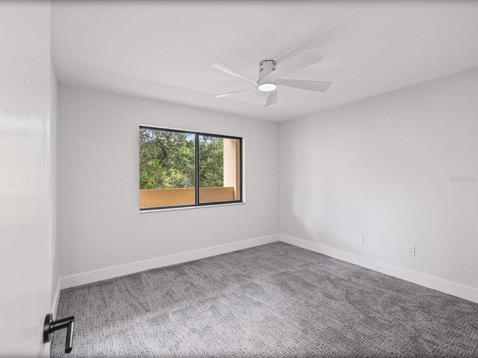 Guest bedroom conveniently located with privacy in mind - 3076 EASTLAND BLVD #203, CLEARWATER