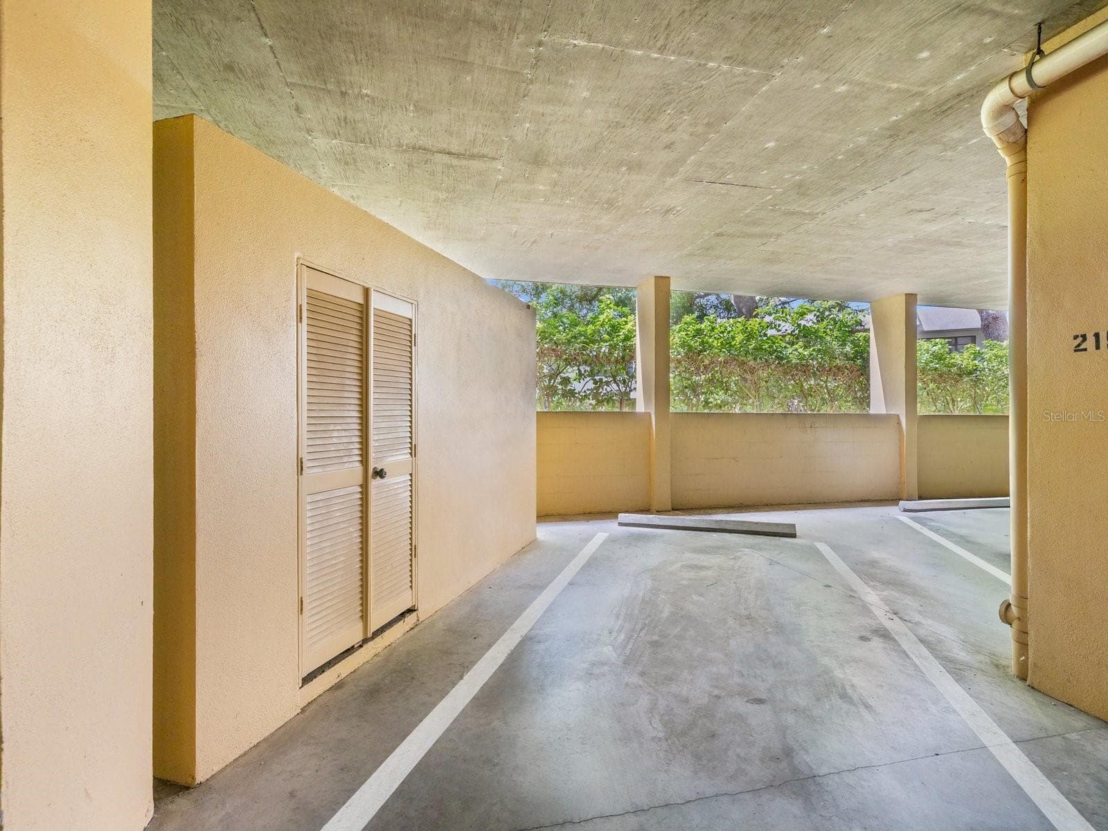 Designated Parking Spot #215 with storage closet for extras! - 3076 EASTLAND BLVD #203, CLEARWATER