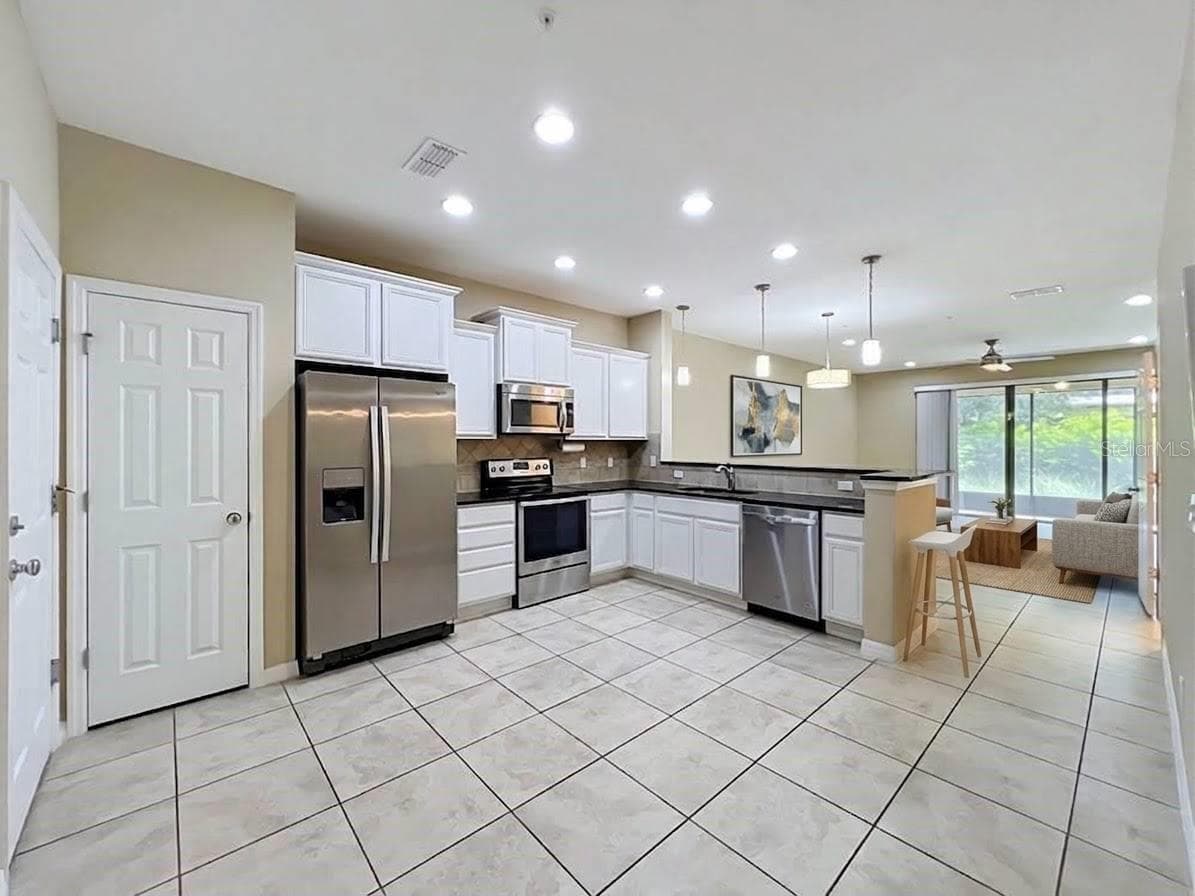 Townhouse at 520 VIRTUOSO LN #68, ORLANDO, photo 7 of 35