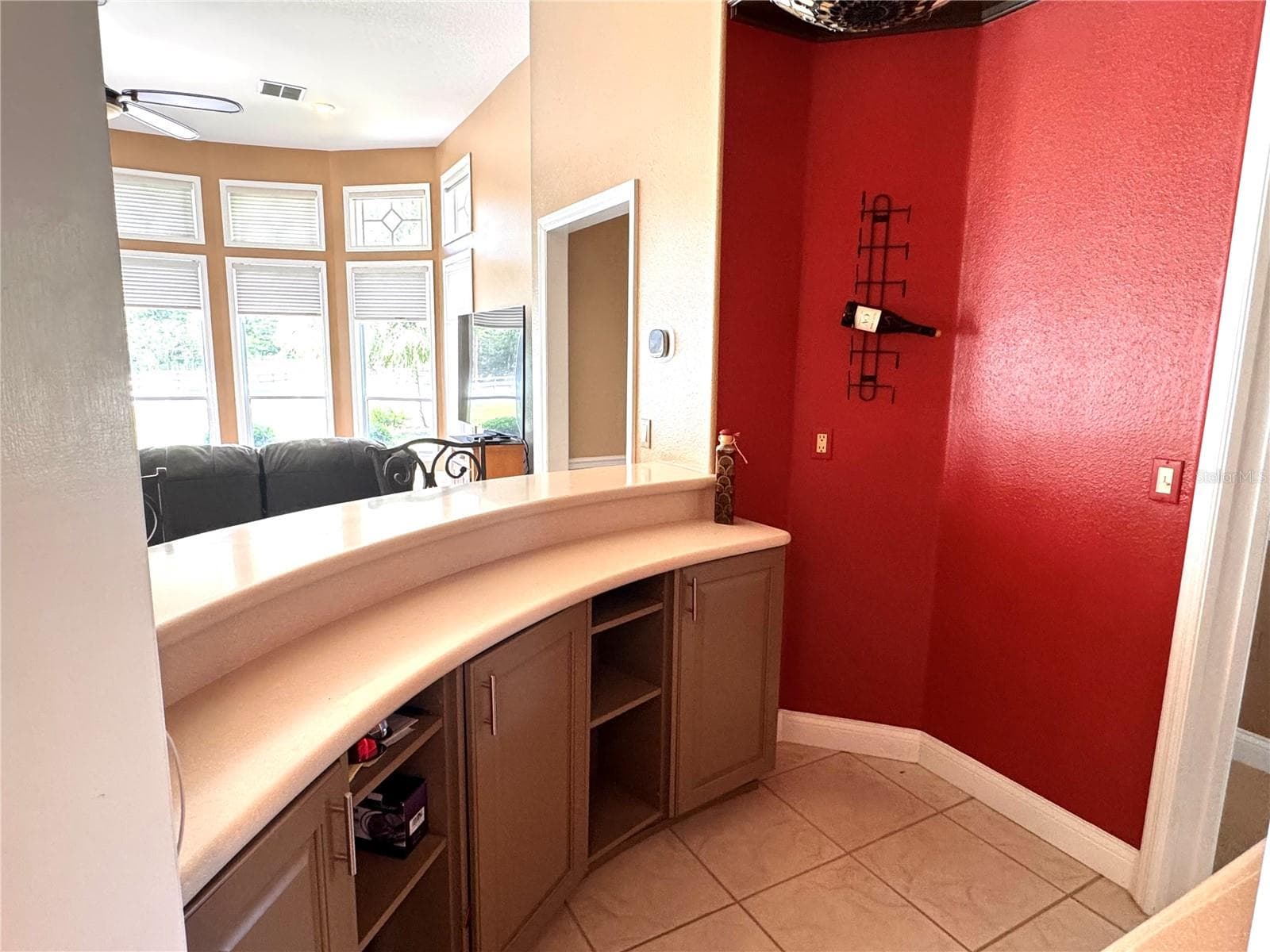 Convenient bar or workspace adds function and additional storage - 6722 W SENTINEL BLUFF PATH, BEVERLY HILLS