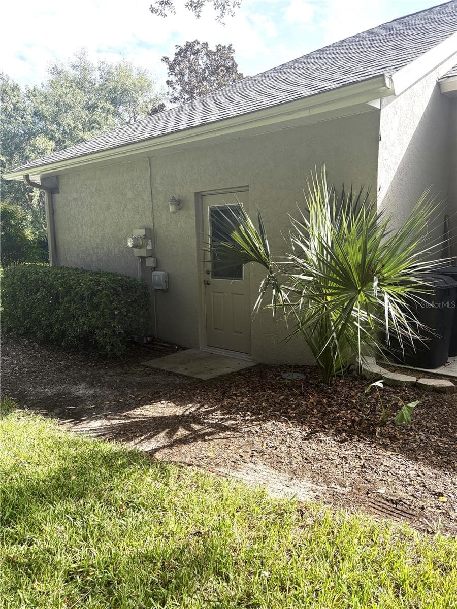 west side of garage - 19588 SW 86TH LN, DUNNELLON