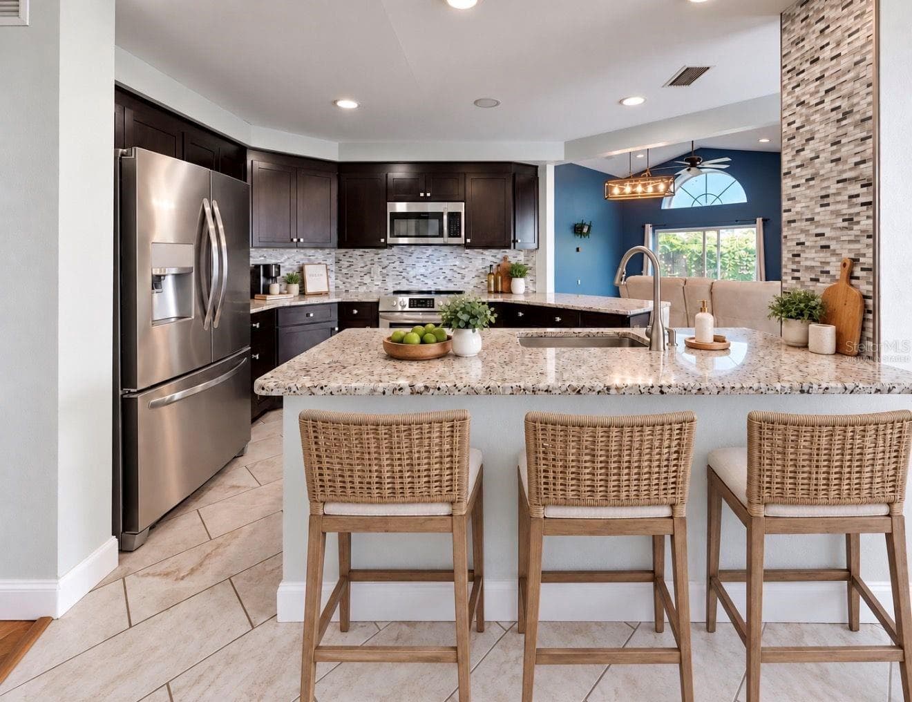 Virtually staged- Kitchen/ breakfast bar - 4115 MURFIELD DR E, BRADENTON