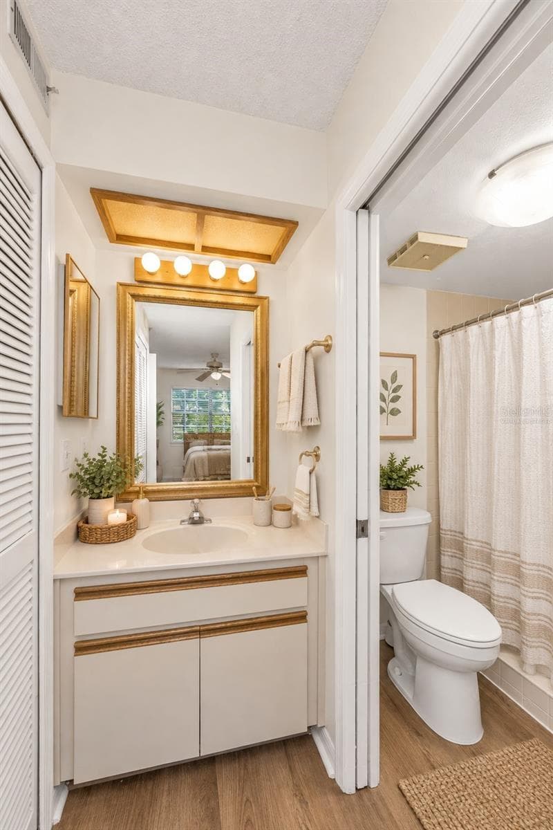 virtually staged, owners suite bath - 2119 ELM ST #103, DUNEDIN