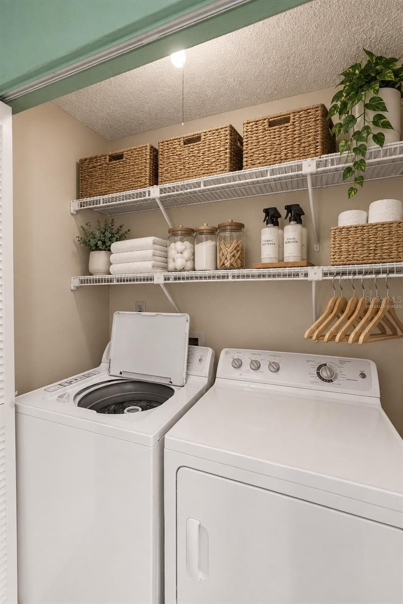 virtually staged, laundry in condo - 2119 ELM ST #103, DUNEDIN