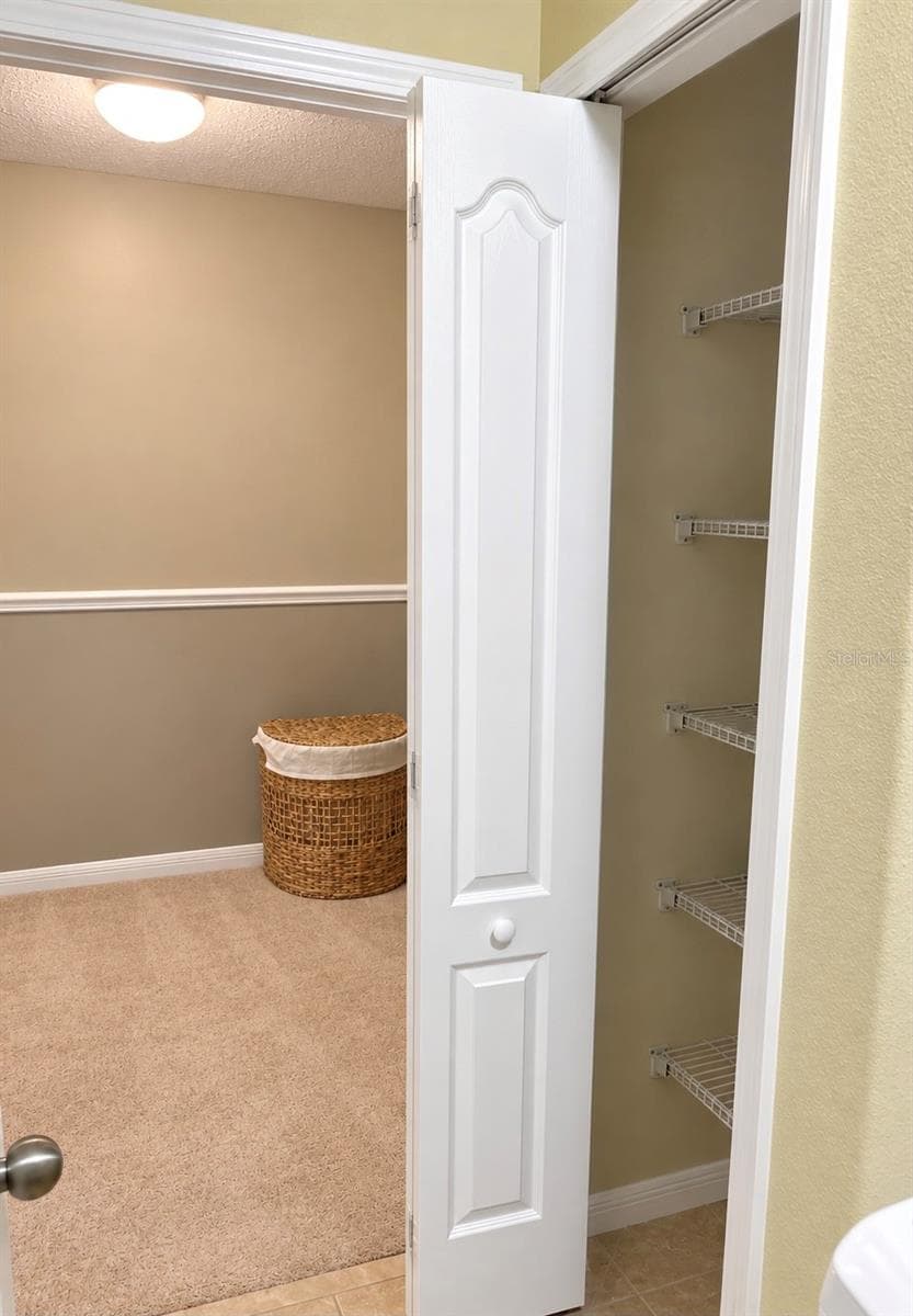 Laundry closet - 9412 TRUMPET VINE LOOP, TRINITY