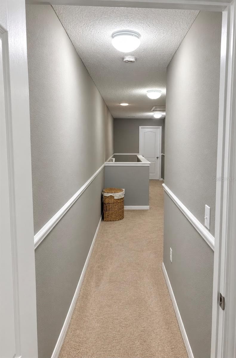 Hallway upstairs - 9412 TRUMPET VINE LOOP, TRINITY