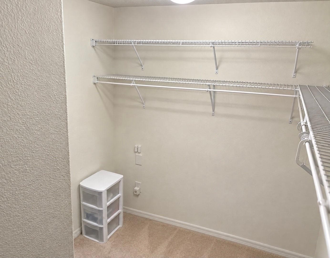 Master bedroom closet - 9412 TRUMPET VINE LOOP, TRINITY