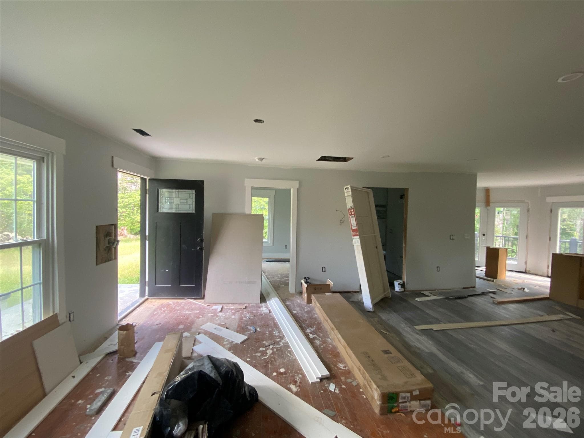 Beautiful real wood floors preserved and ready to be refinished in the front of the house - 615 Vine Arden Road, Morganton