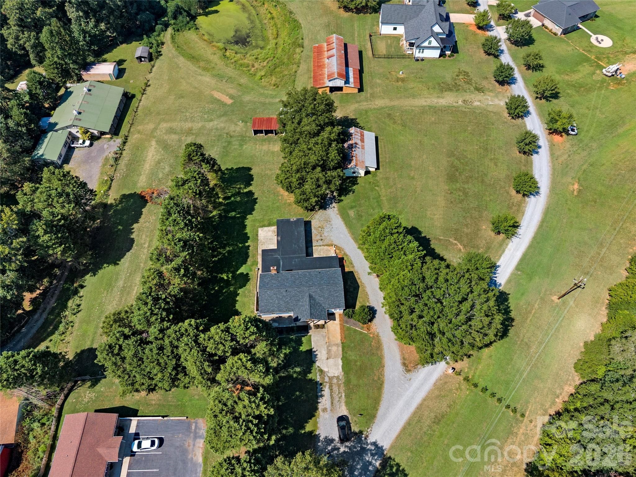 .86 acre lot surrounded by mature trees and offering private driveways to each entry point - 109 Woodside Avenue, Gastonia