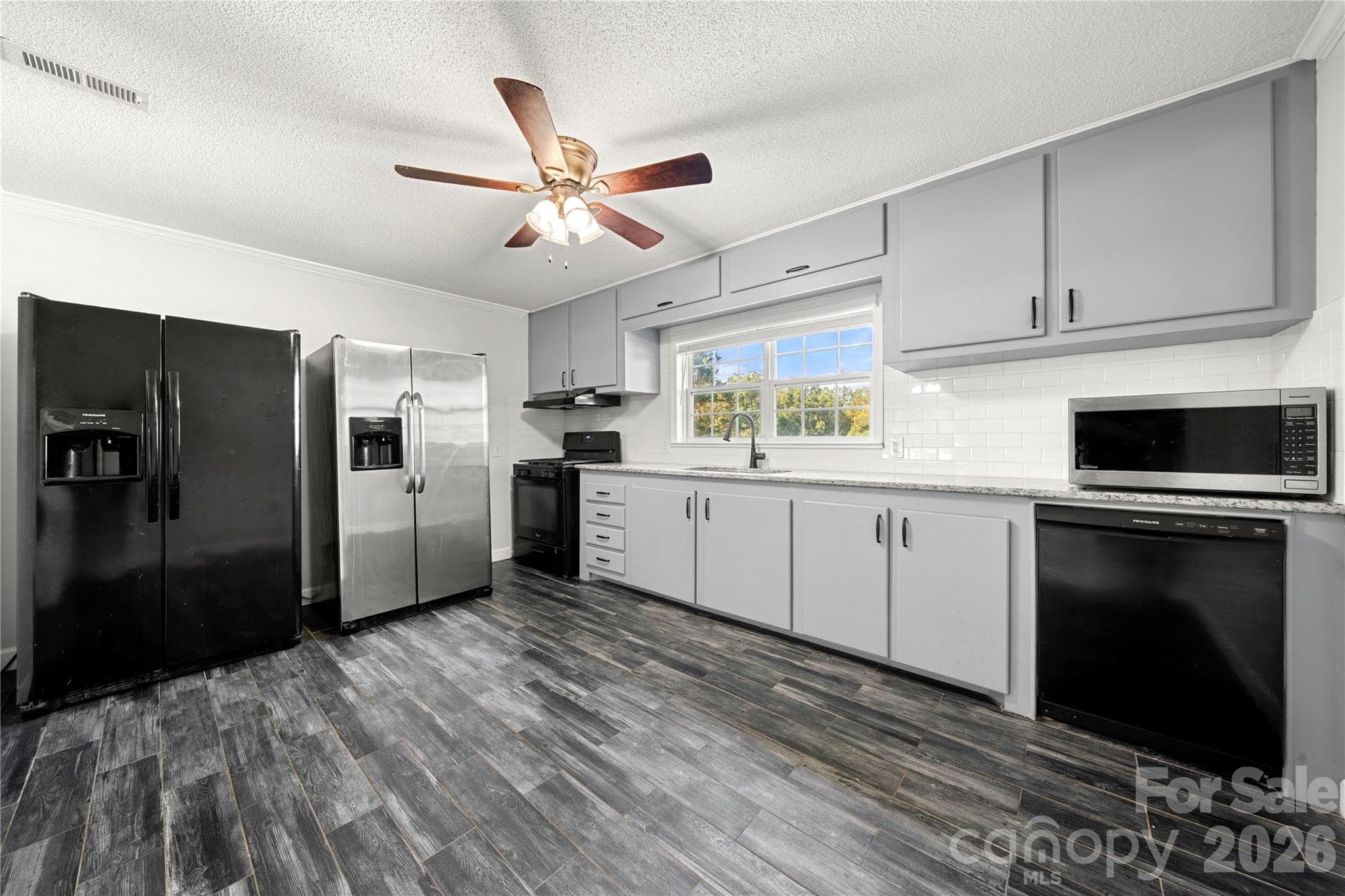 Main level kitchen - both fridges to convey - 109 Woodside Avenue, Gastonia