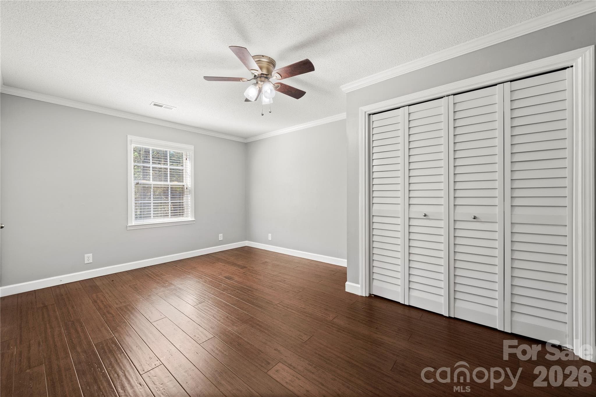Main level secondary bedroom boasting two closets - 109 Woodside Avenue, Gastonia