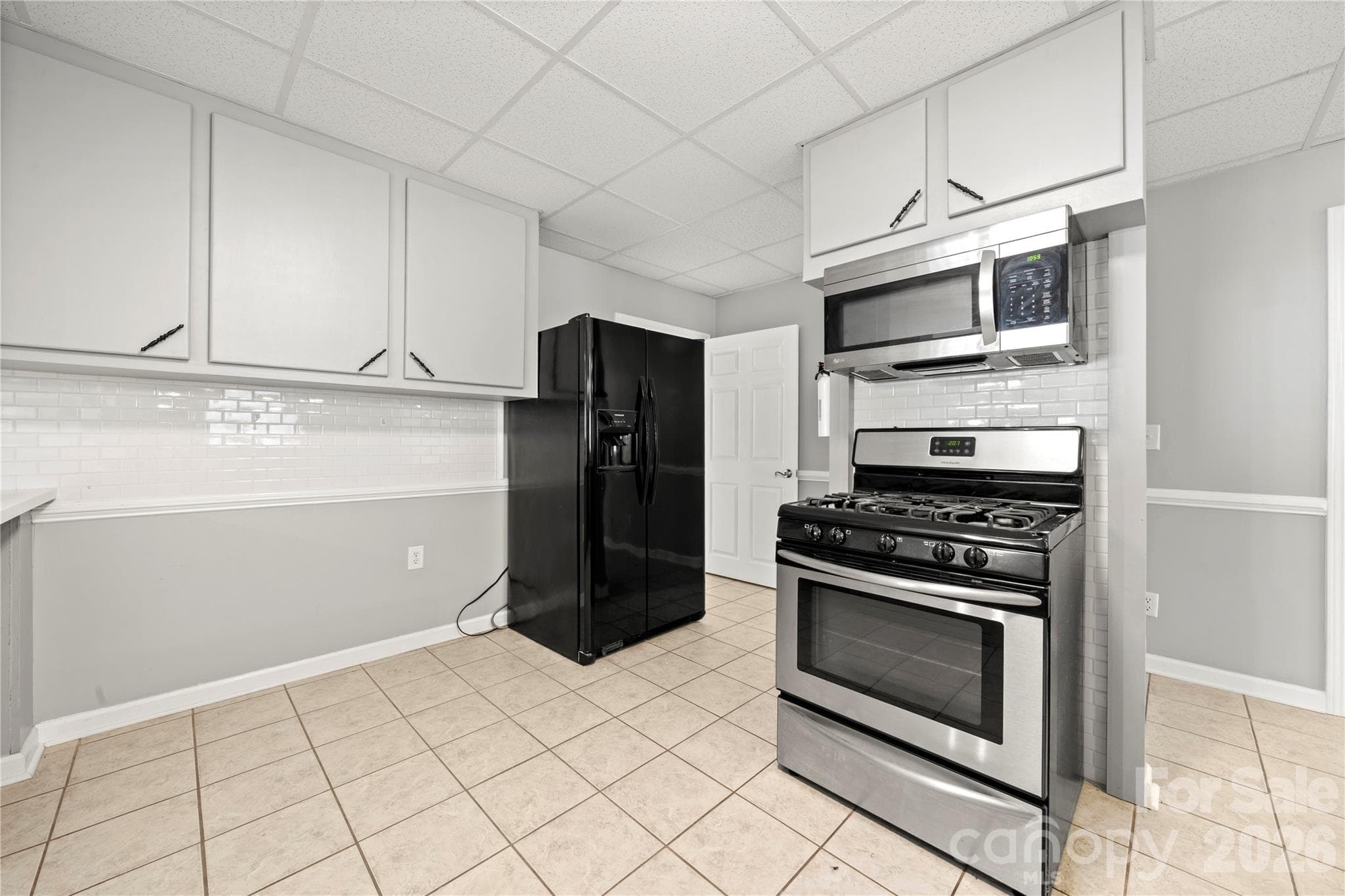Basement level full kitchen - fridge to convey - 109 Woodside Avenue, Gastonia