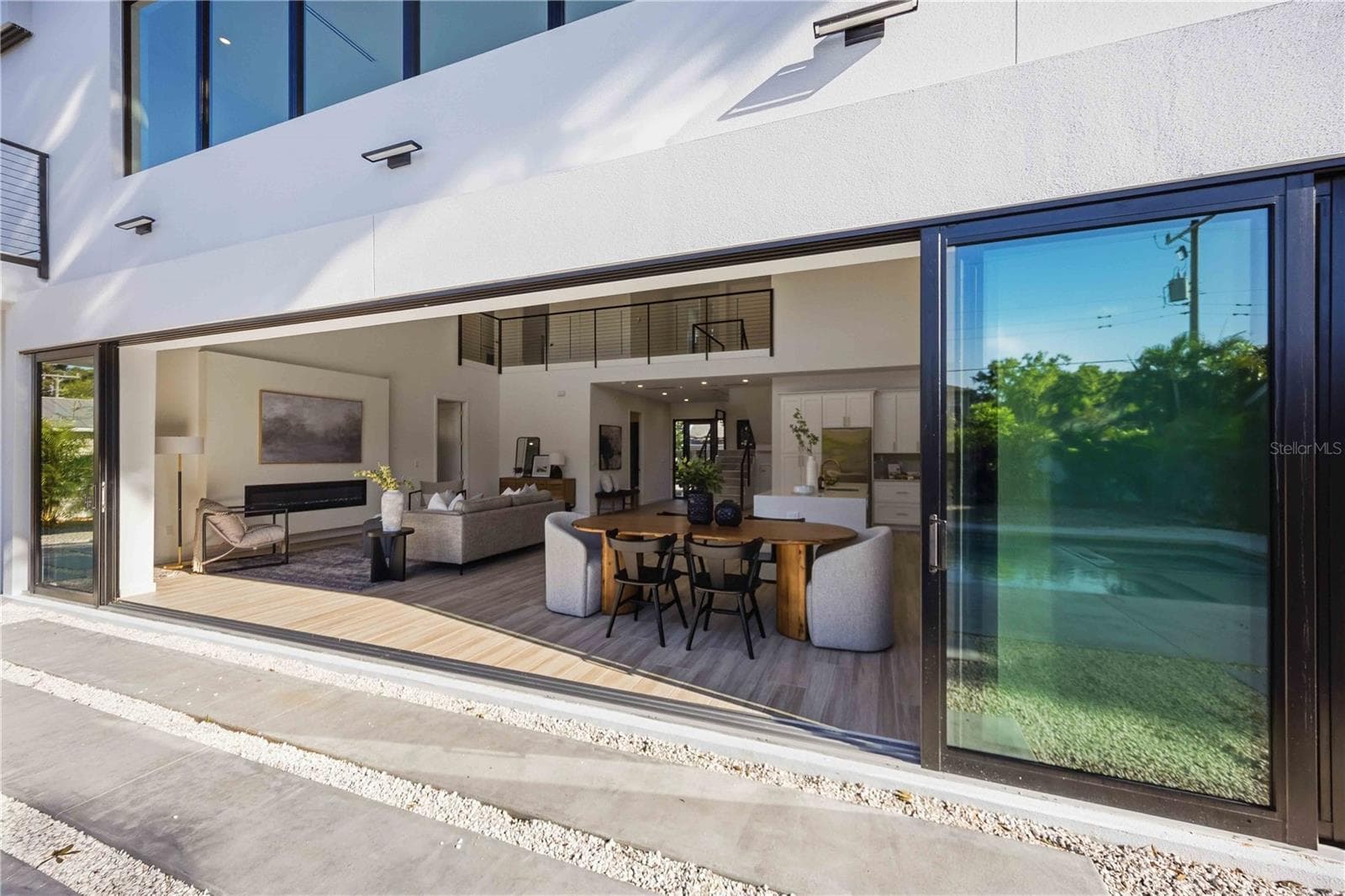 Clear span view to pool from living area - 2258 ARLINGTON ST, SARASOTA