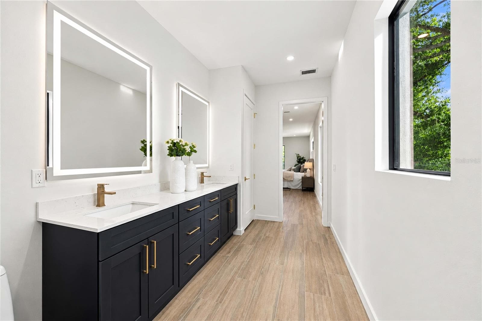2nd Floor ensuite bathroom (#3) to primary bedroom (#3) - 2258 ARLINGTON ST, SARASOTA