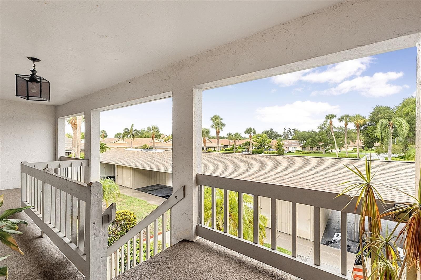 CARPORT & STORAGE @ YOUR DOORSTEP - 7143 WOOD CREEK DR #203, SARASOTA
