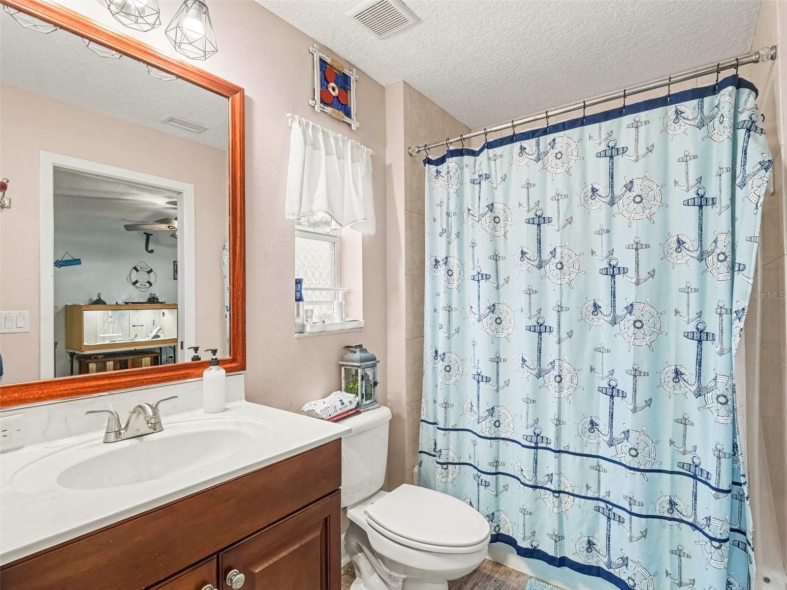 Jack and Jill bath for Bedrooms 2 & 3 - 7124 34TH ST E, SARASOTA