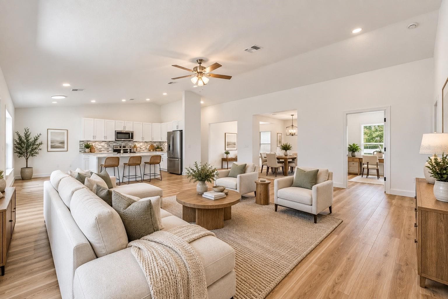 Virtually StagedLiving room - 14586 MOCKING WREN RD, WEEKI WACHEE