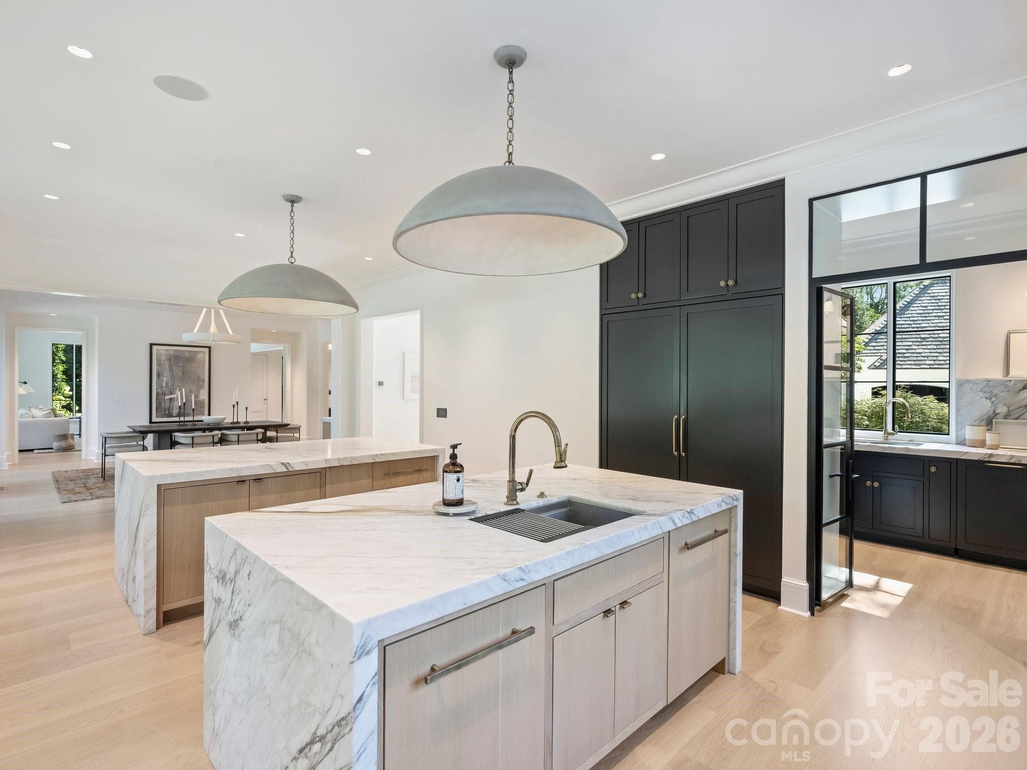 Panoazzo Marble island with custom mitered edges and Waterworks fixture - 600 Hermitage Road, Charlotte