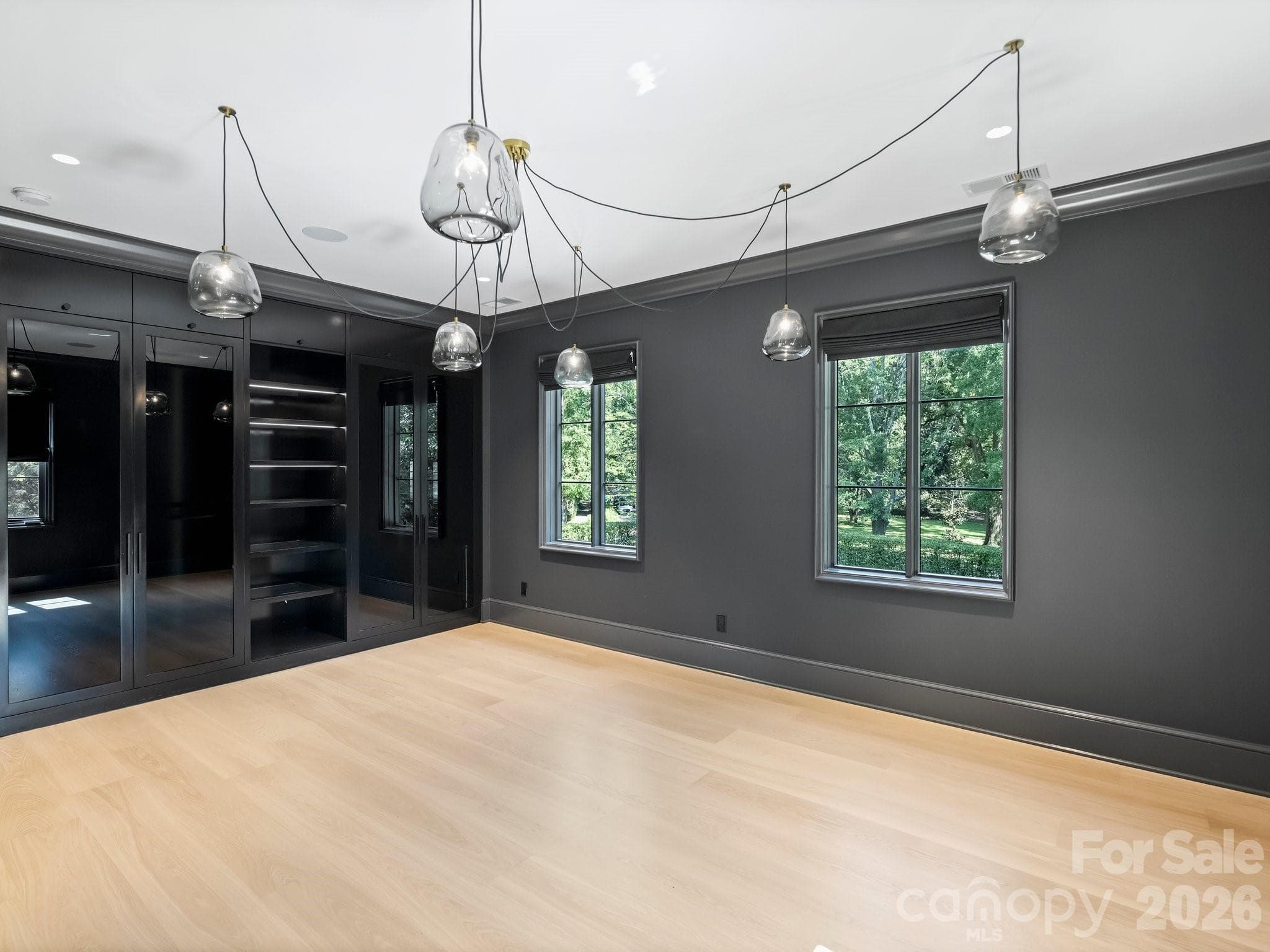 Upper level Guest Suite 1 with fun modern custom closet system - 600 Hermitage Road, Charlotte