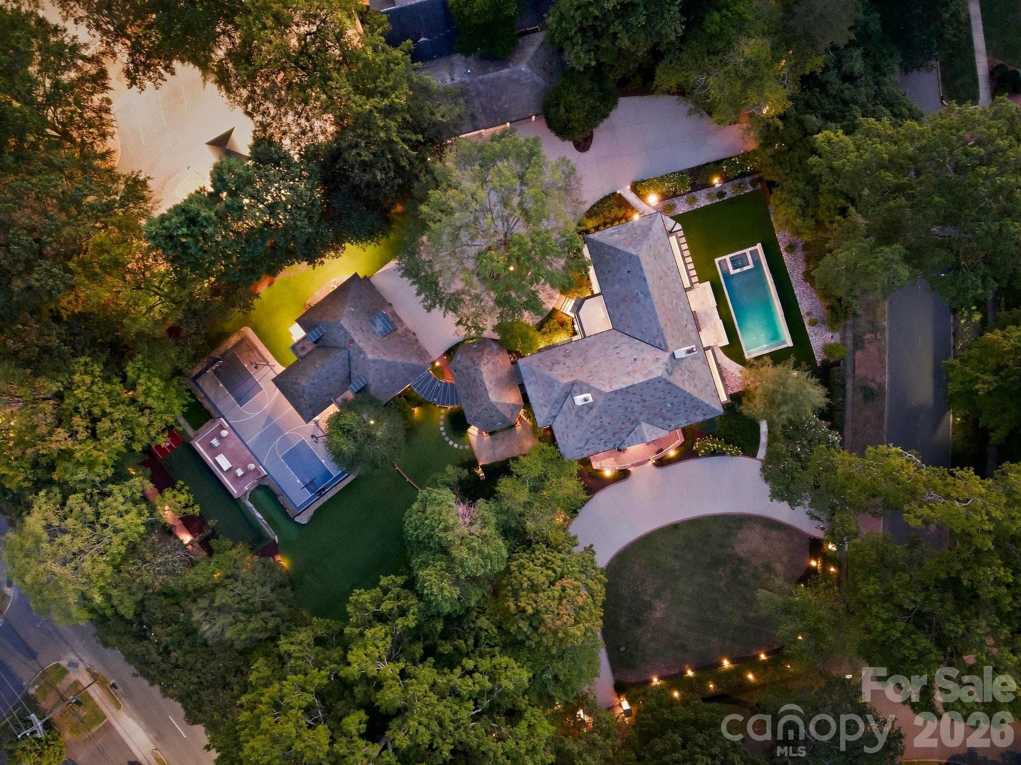 Twilight Aerial of this 1.3 acre estate situated on the corners on Hermitage and Granville Roads - 600 Hermitage Road, Charlotte