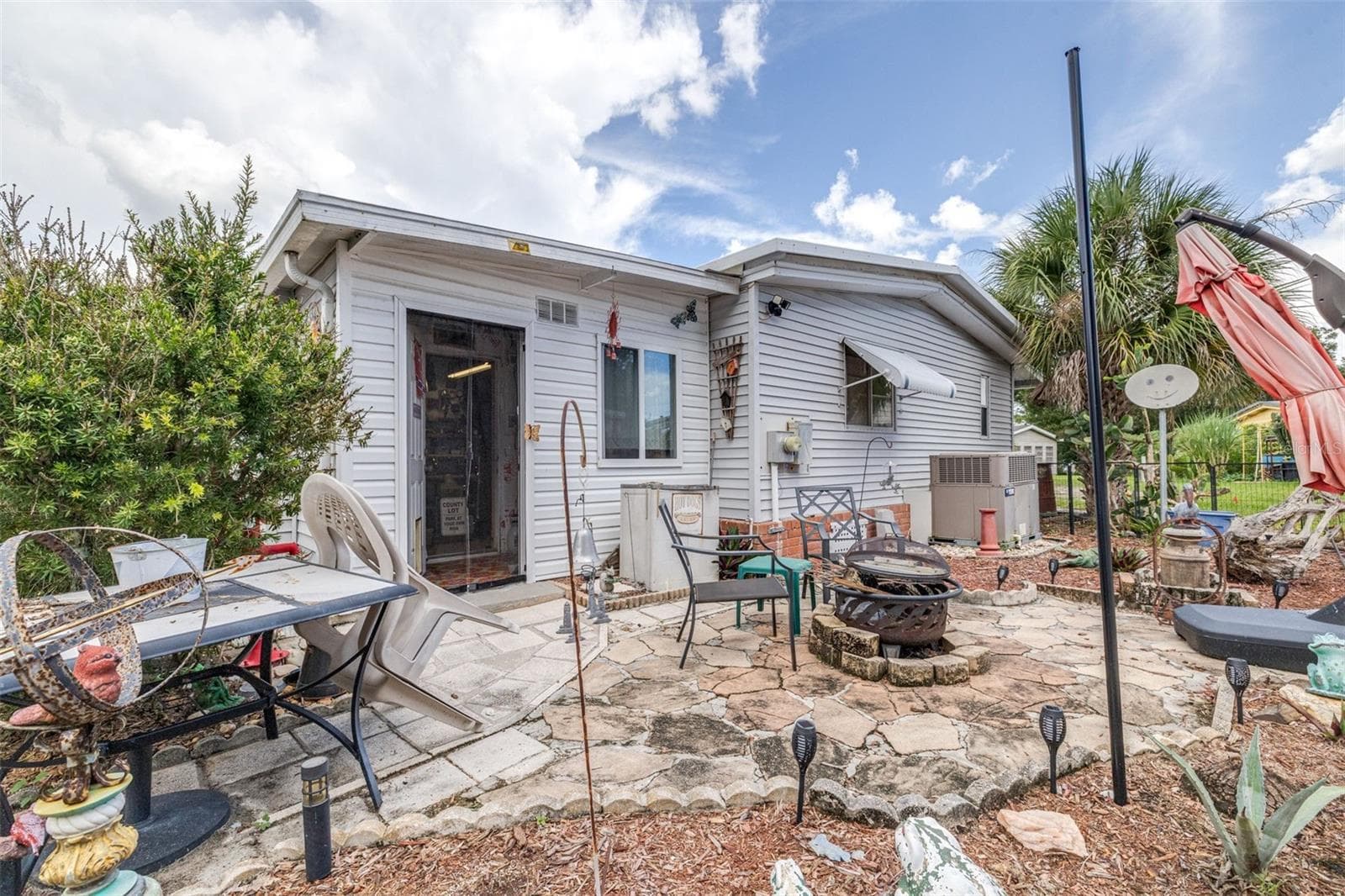 Manufactured Home at 8 WOODLAND CIR, HAINES CITY, photo 25 of 35