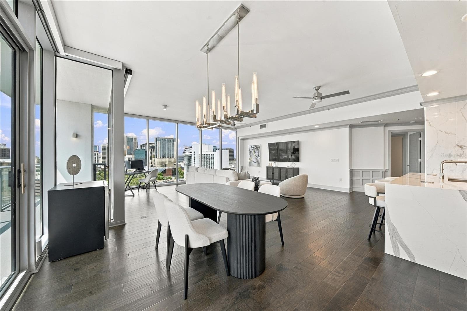 Dining has panoramic city views for entertaining guests. - 260 S OSCEOLA AVE #1406, ORLANDO