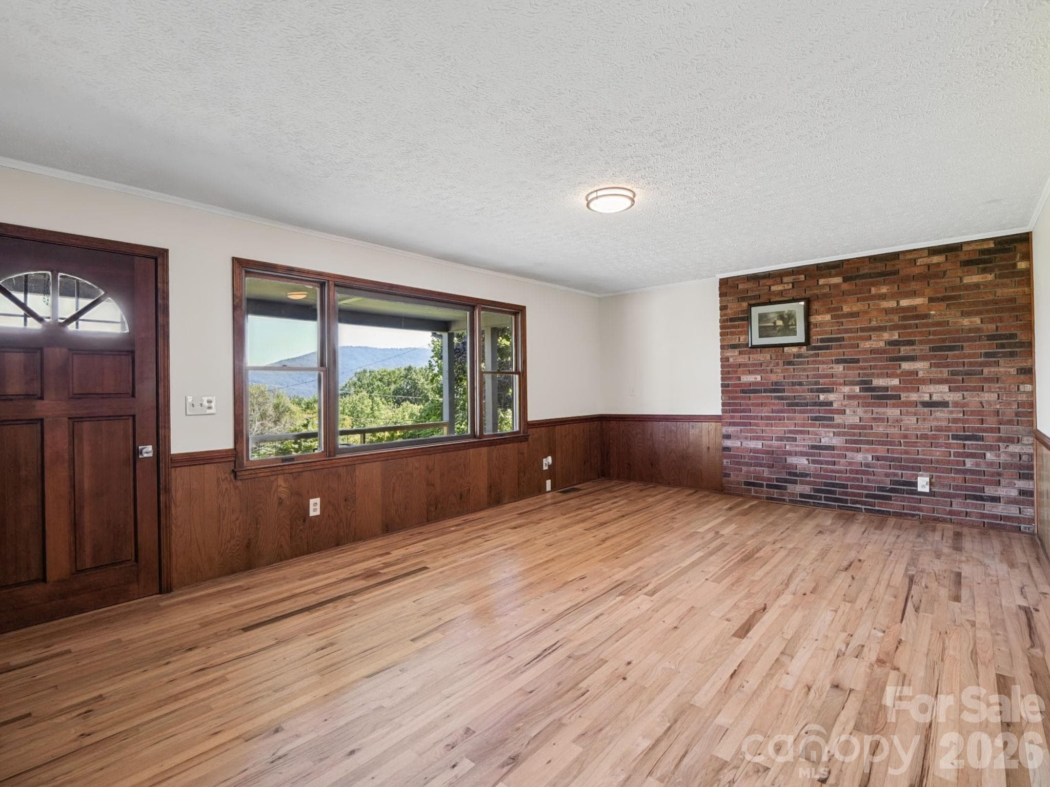 Living room with large windows - 727 E Lyda Road, Hendersonville