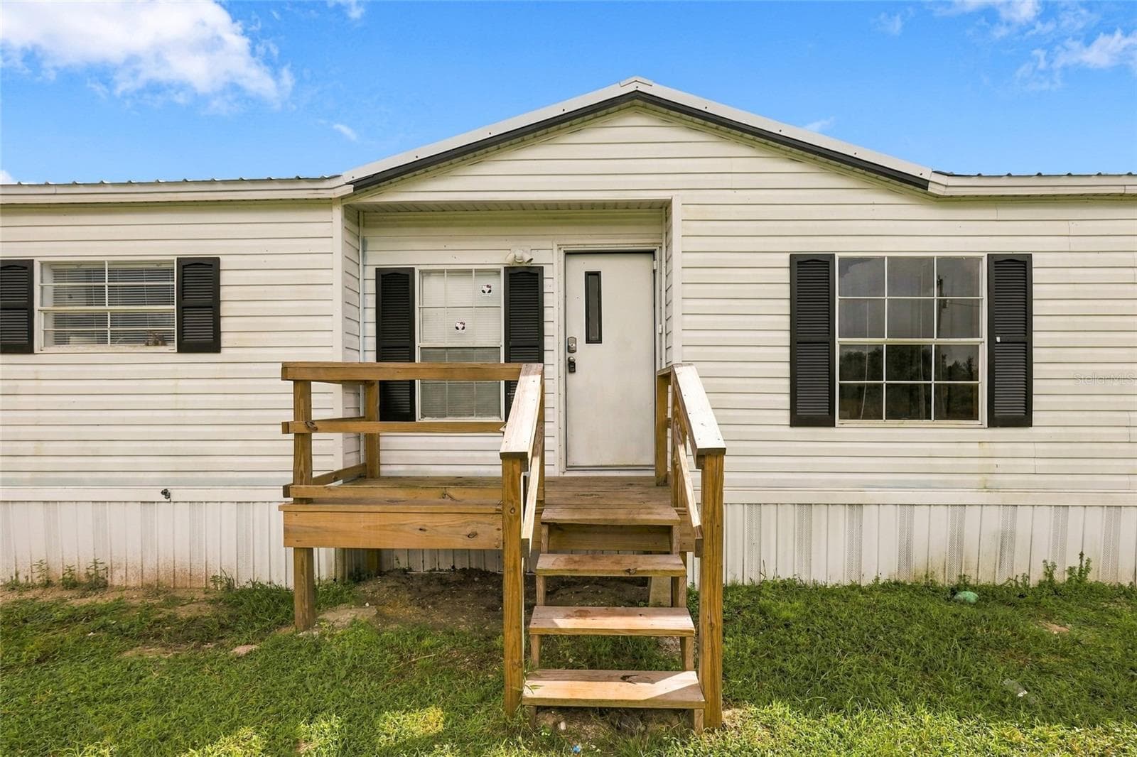 Manufactured Home at 19046 NW 302ND ST, OKEECHOBEE, photo 2 of 52