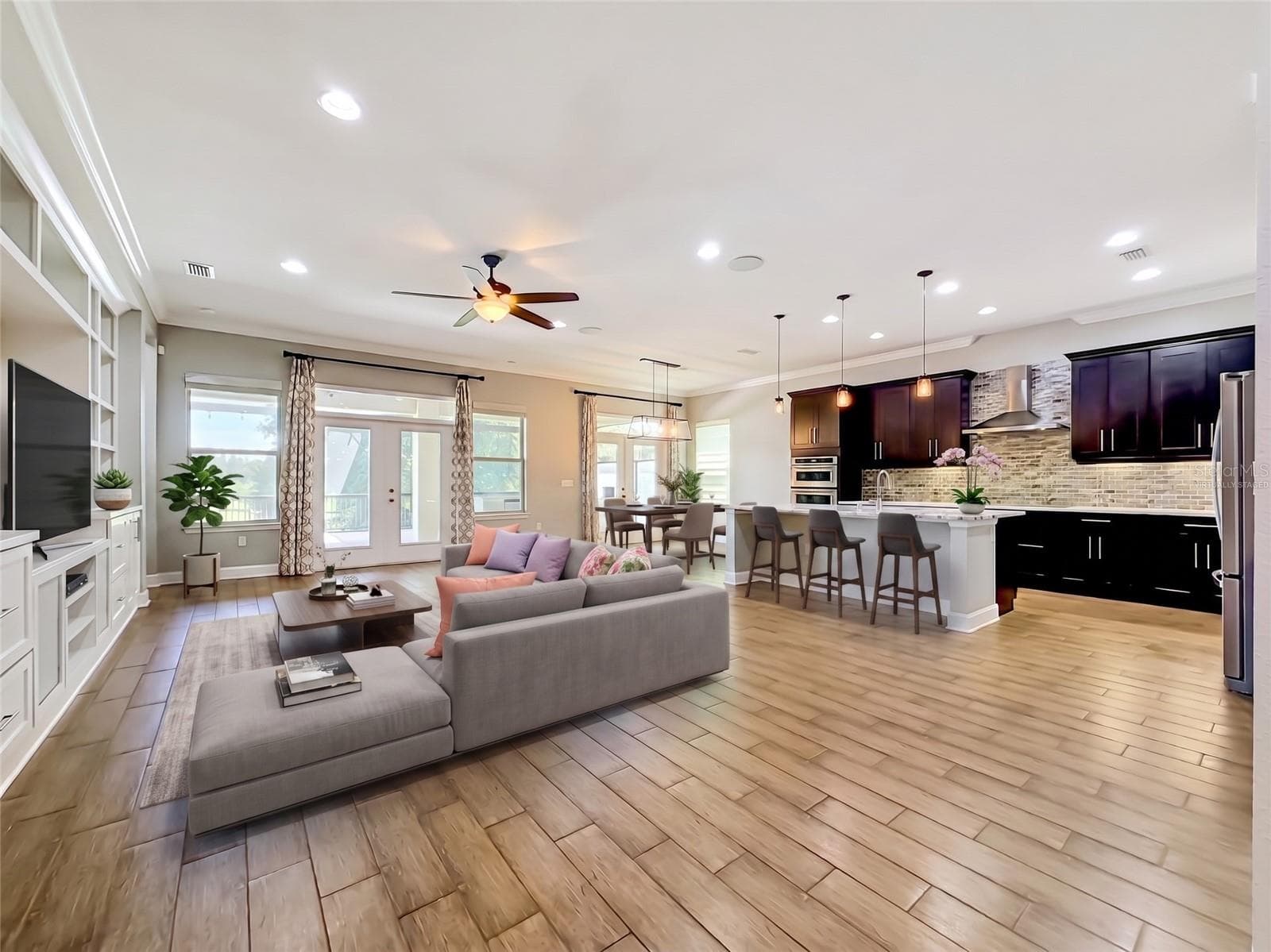Virtually staged living room - 1107 ISOBEL RESERVE LN, TAMPA