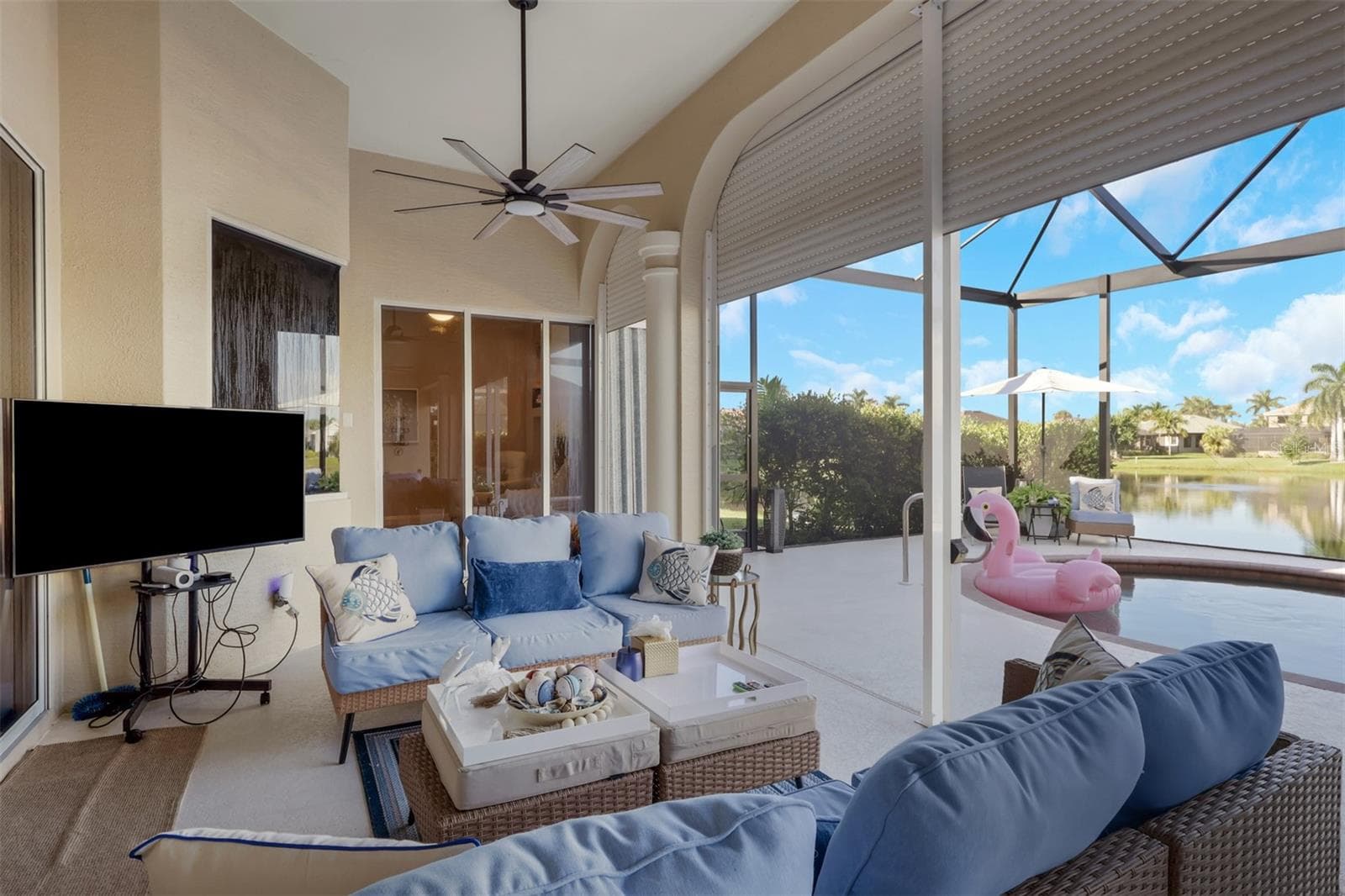 lanai with multiple seating areas - 8451 SOUTHWIND BAY CIR, FORT MYERS