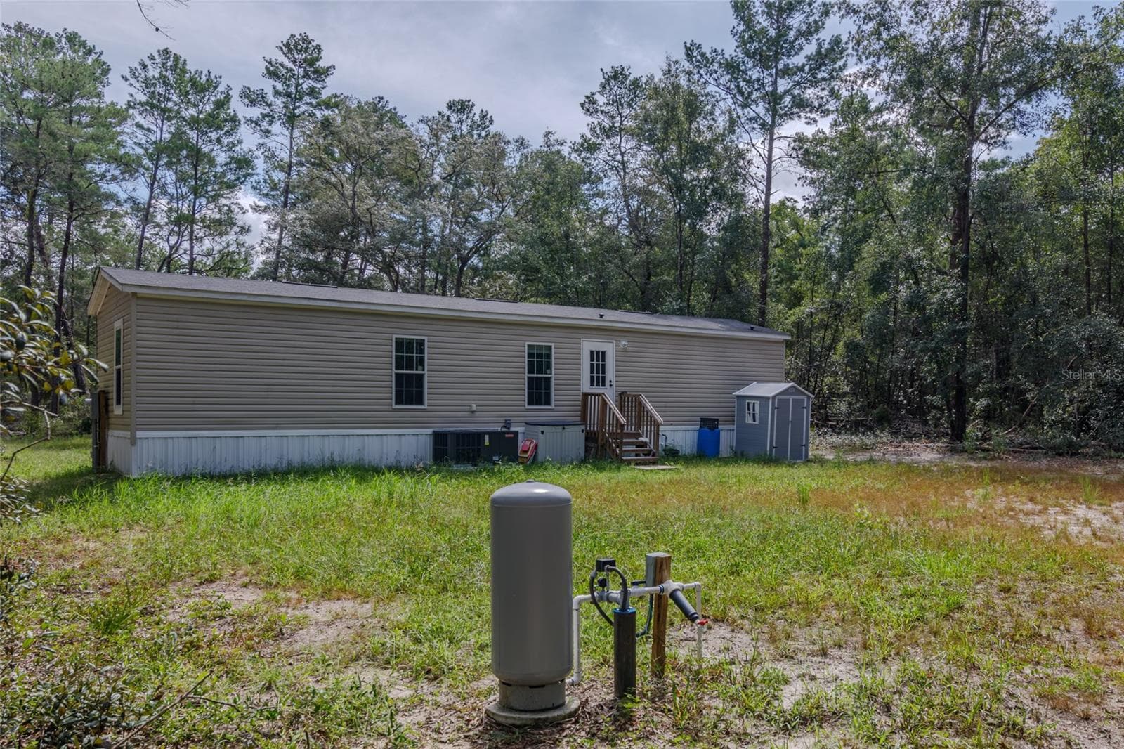 Manufactured Home at 23778 NE 113TH AVE, FORT MC COY, photo 3 of 22