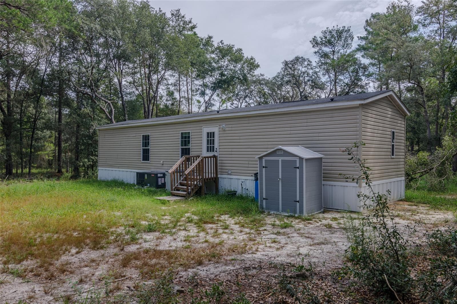 Manufactured Home at 23778 NE 113TH AVE, FORT MC COY, photo 4 of 22