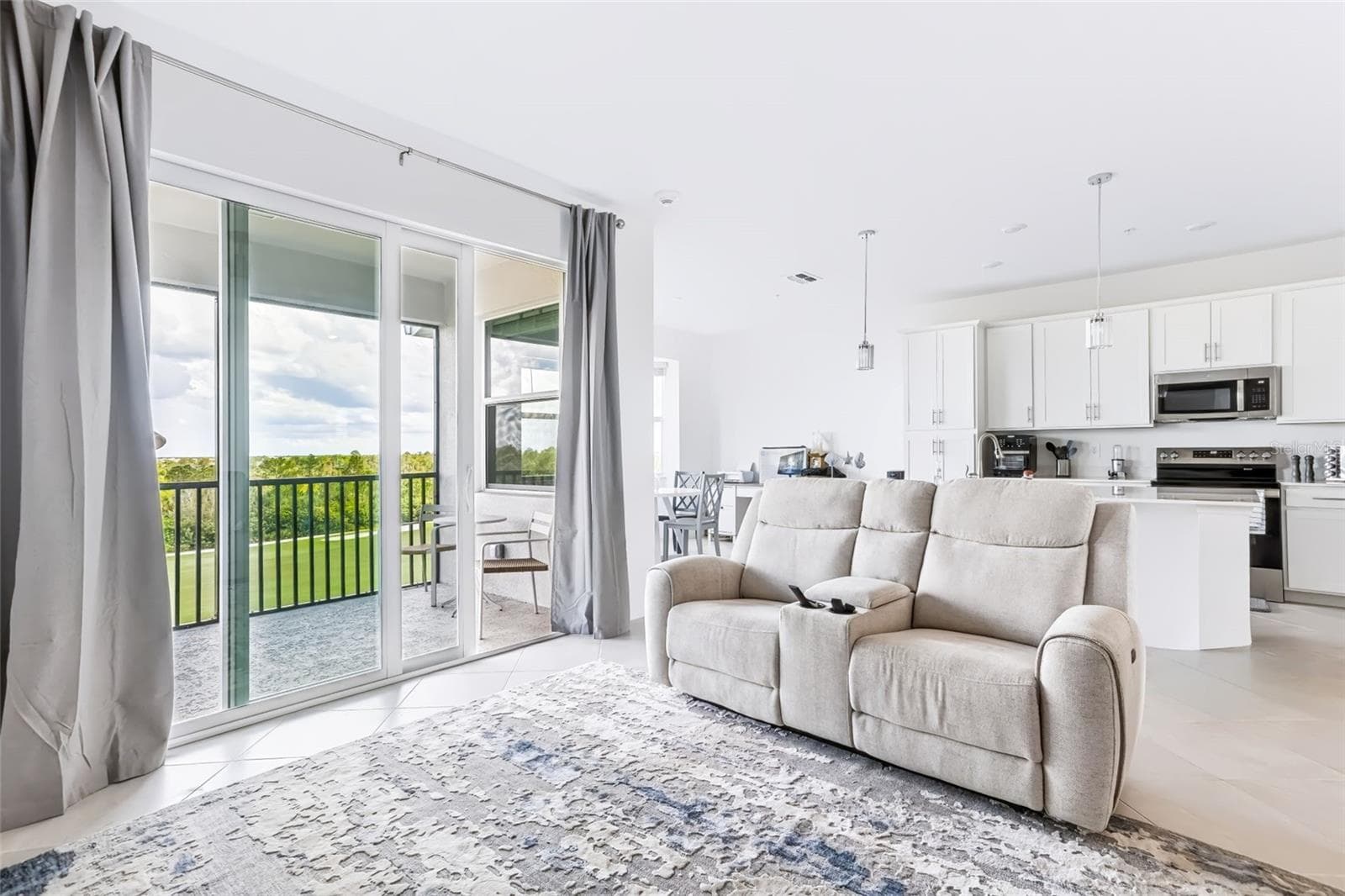 Living Room/Balcony - 17600 OPAL SAND DR #402, VENICE