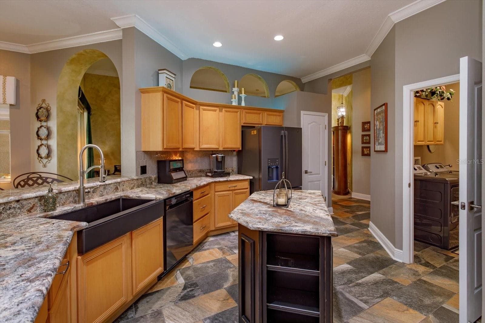 black granite apron sink and new frig & dishwasher - 536 AVON GLADE PL, SANFORD