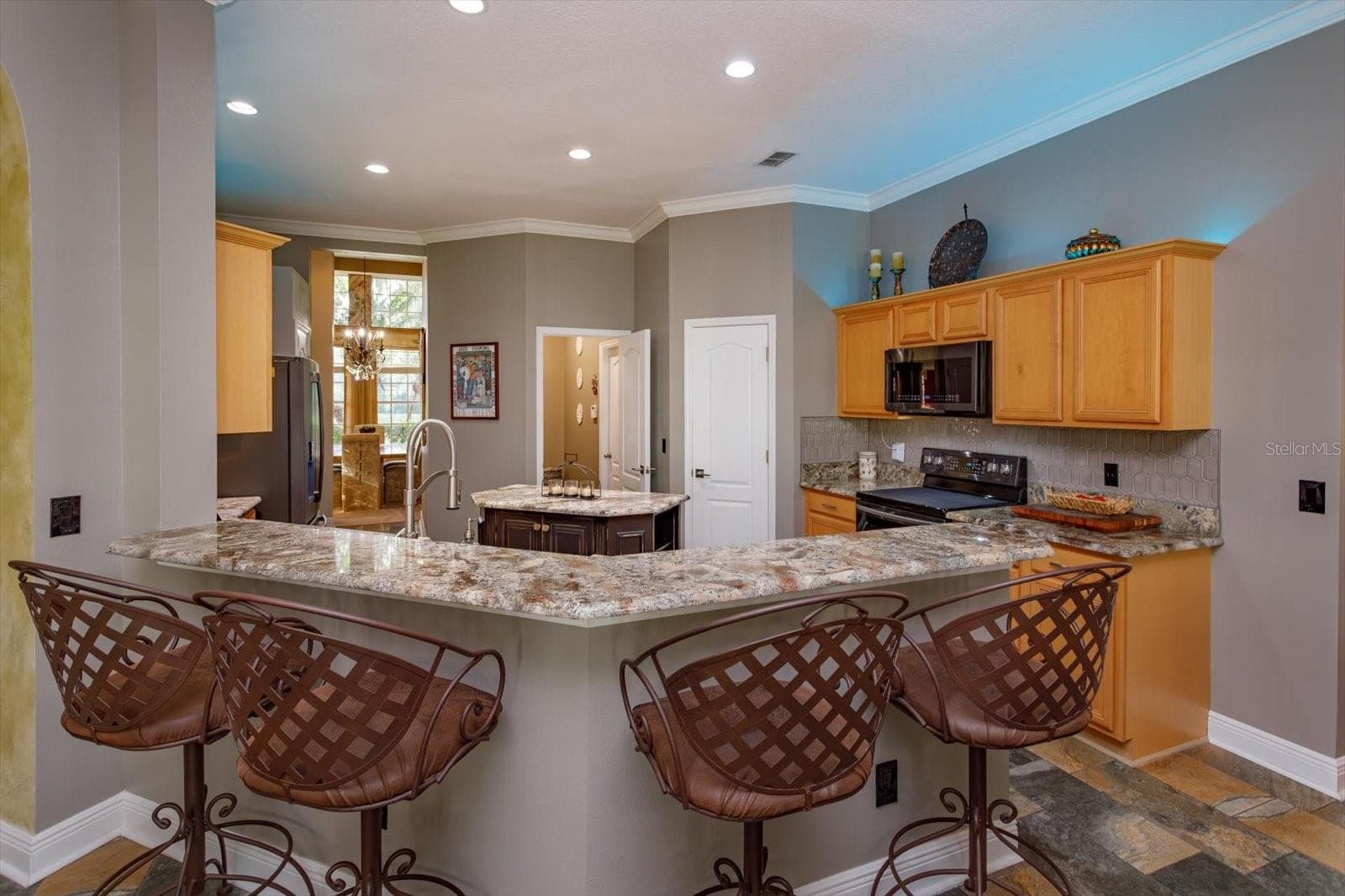 kitchen looking towards dining room - 536 AVON GLADE PL, SANFORD
