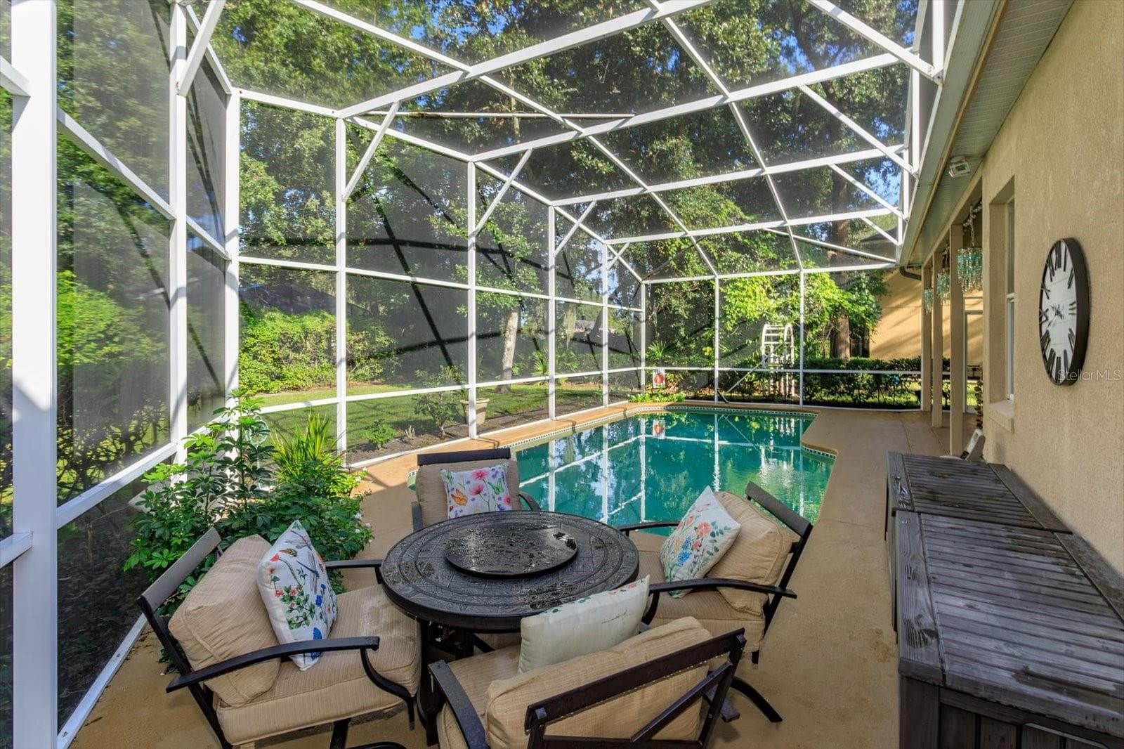 plenty of room for poolside dining - 536 AVON GLADE PL, SANFORD