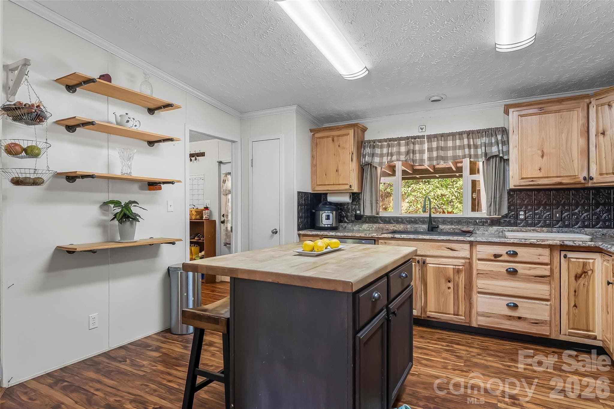 Kitchen island with seating - 245 Merry Way, Clyde