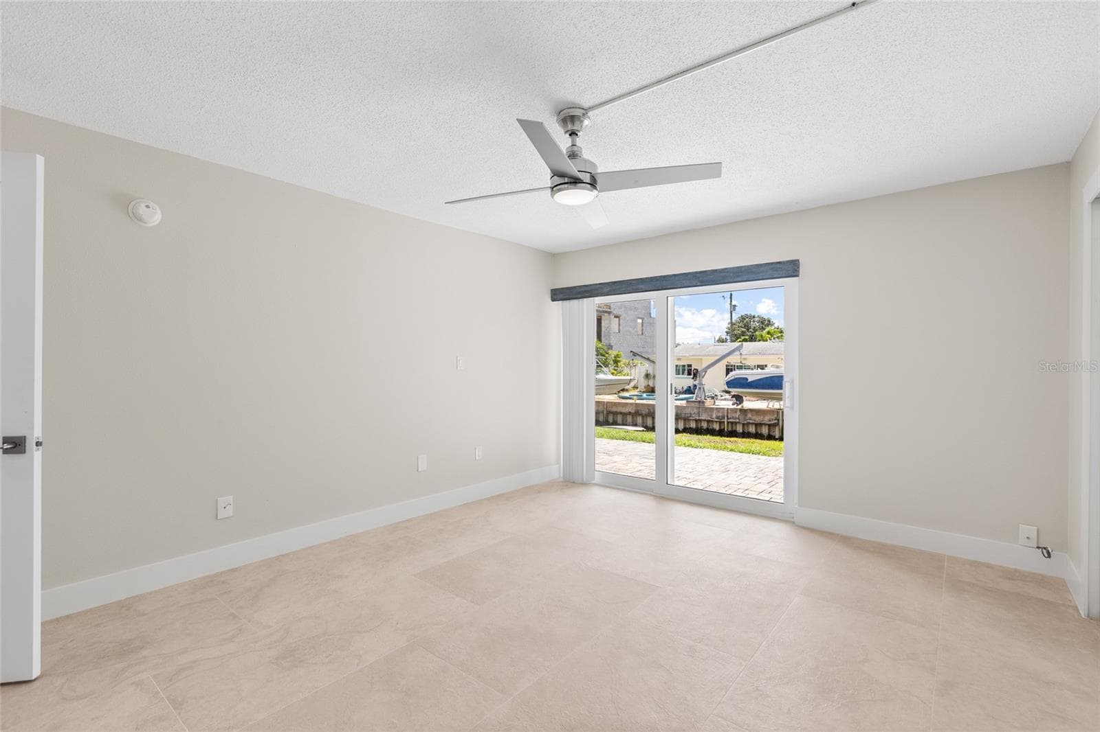 Access to Rear Patio/Canal - 433 S PAULA DR #1, DUNEDIN