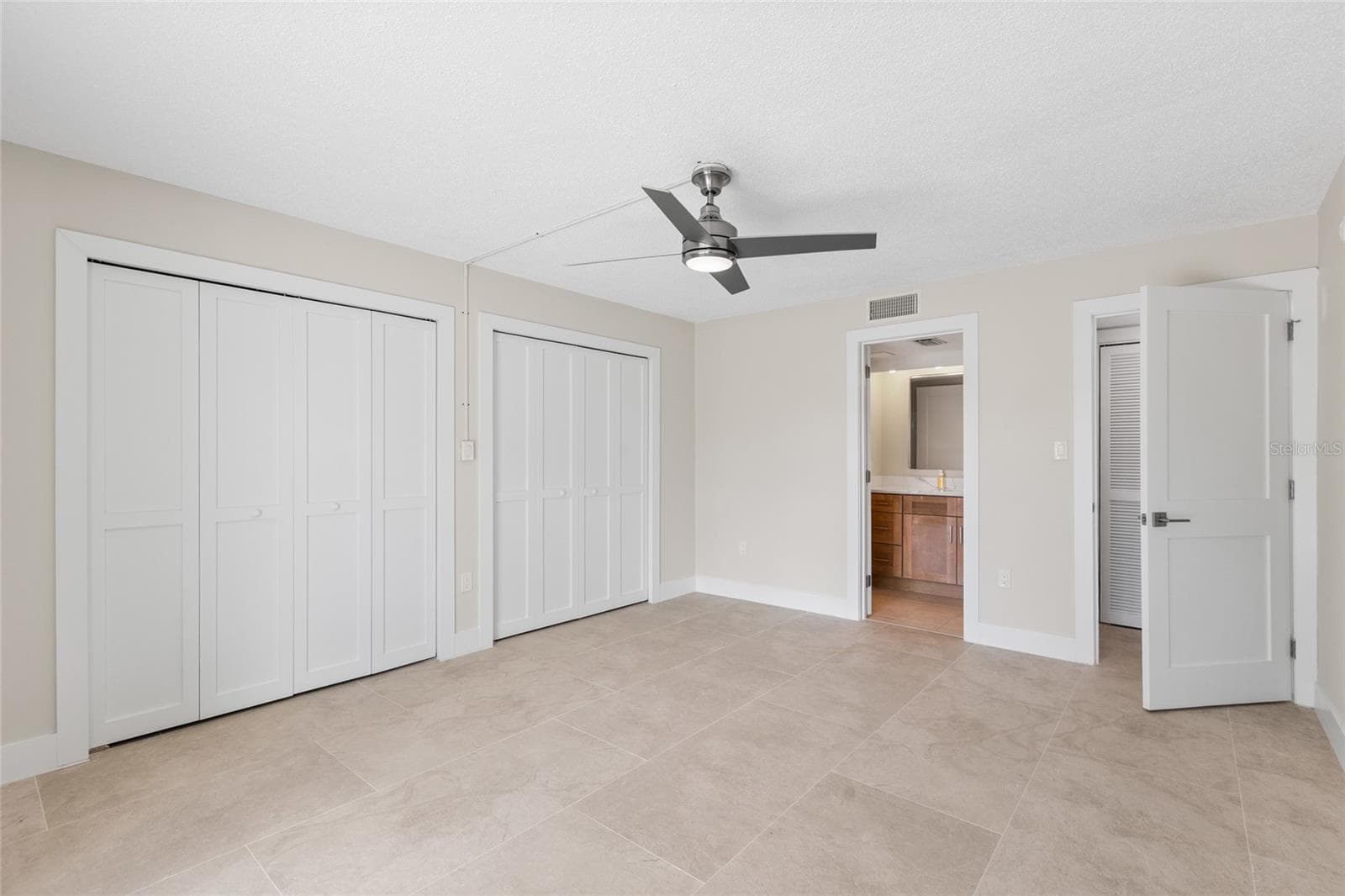 NEW Ceramic Tile Flooring & Ceiling Fan - 433 S PAULA DR #1, DUNEDIN