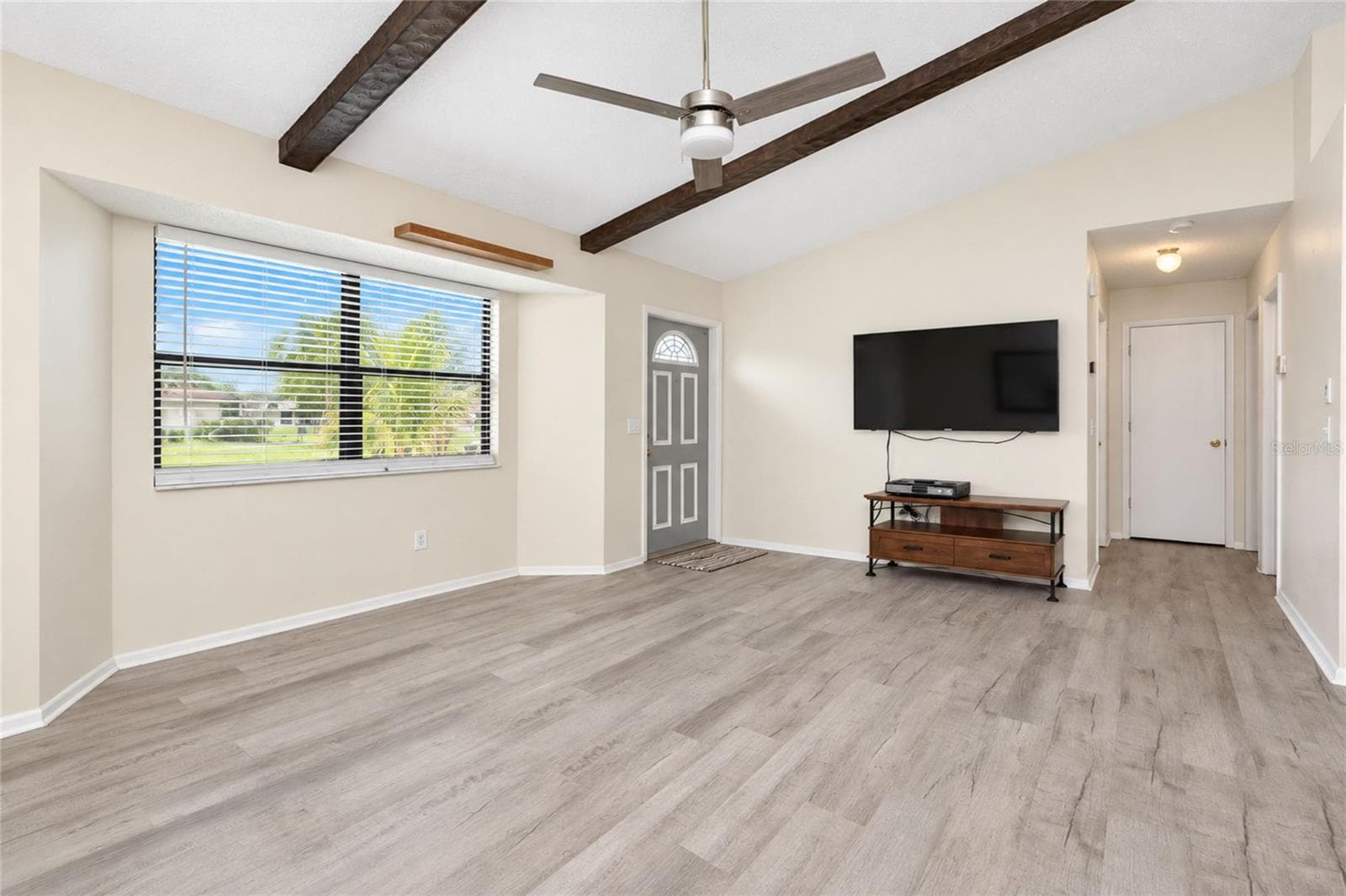 Living room.  the hallway leads to the bedrooms and full bath. - 21293 PEMBERTON AVENUE, PORT CHARLOTTE