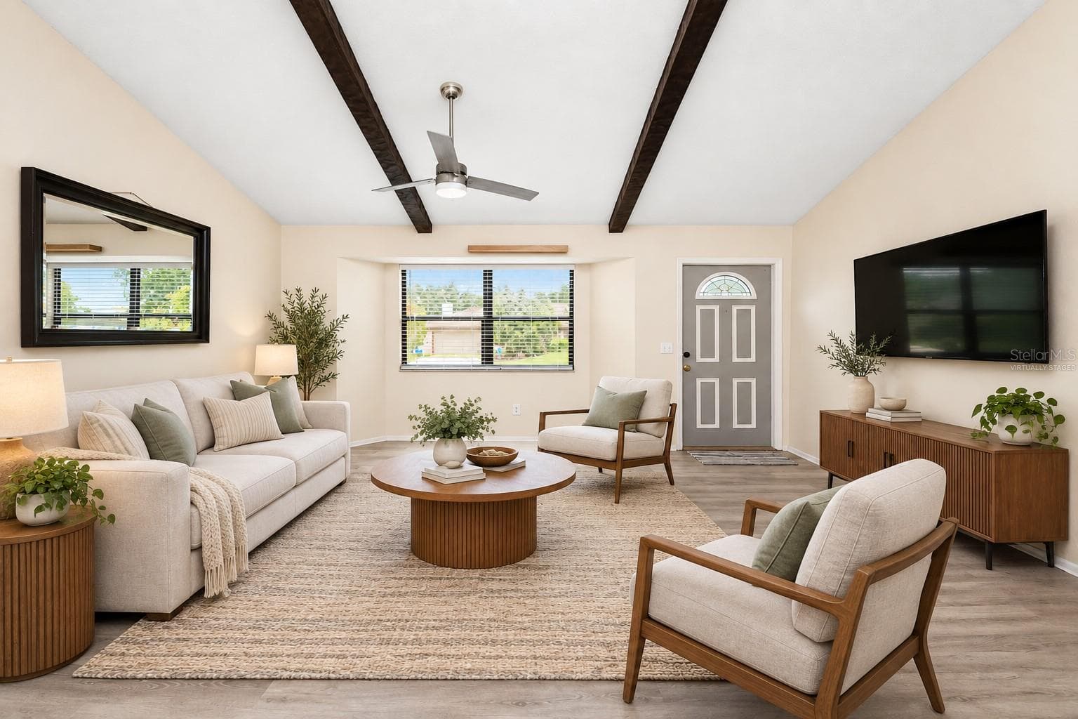 View from the kitchen of the living room.  VIRTUALLY STAGED. - 21293 PEMBERTON AVENUE, PORT CHARLOTTE