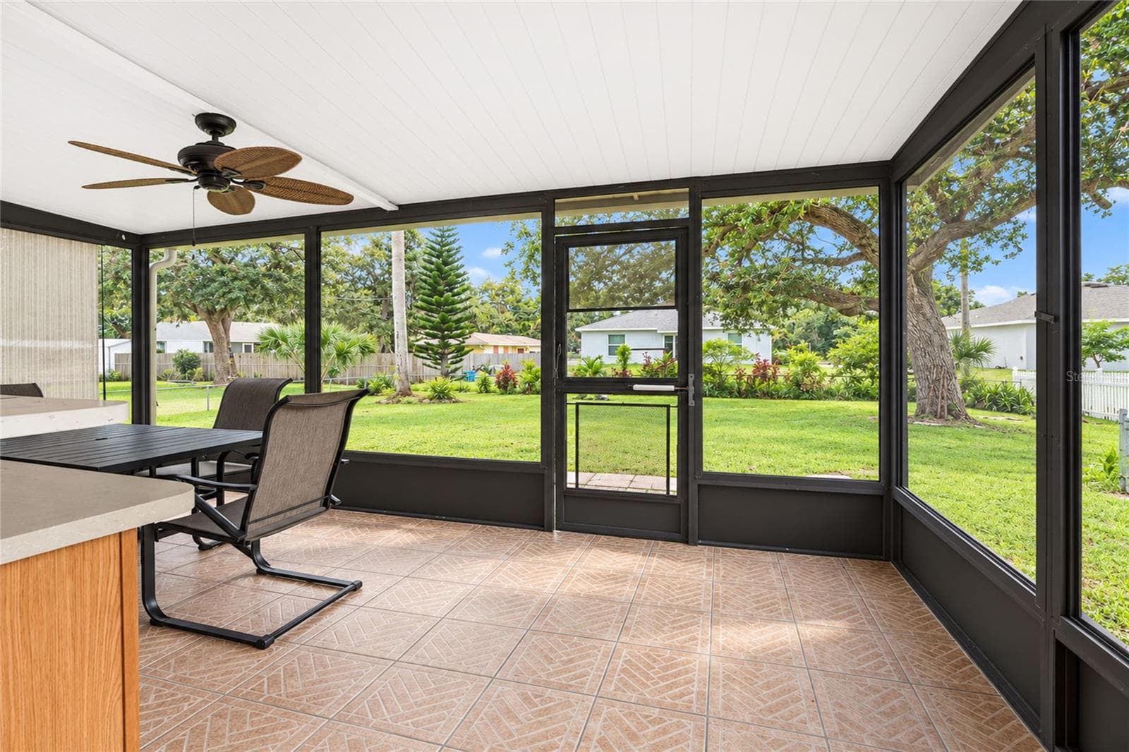 Rear, screened porch and fenced back yard. - 21293 PEMBERTON AVENUE, PORT CHARLOTTE