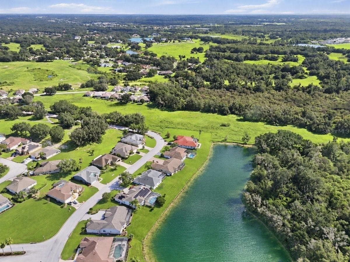 Pond is AI generated - 4458 FAIRWAY OAKS DR, MULBERRY